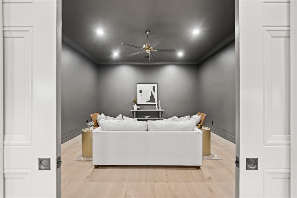 724 Cooper Trail Weatherford, TX 76087 - Photo 26 of 40 Living room featuring wood finished floors, crown molding, recessed lighting, and a ceiling fan