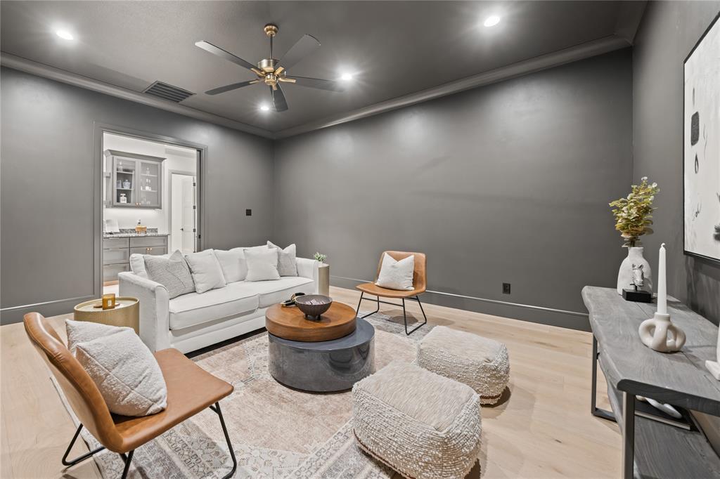 724 Cooper Trail Weatherford, TX 76087 - Photo 27 of 40 Living room with ornamental molding, wood finished floors, recessed lighting, and ceiling fan