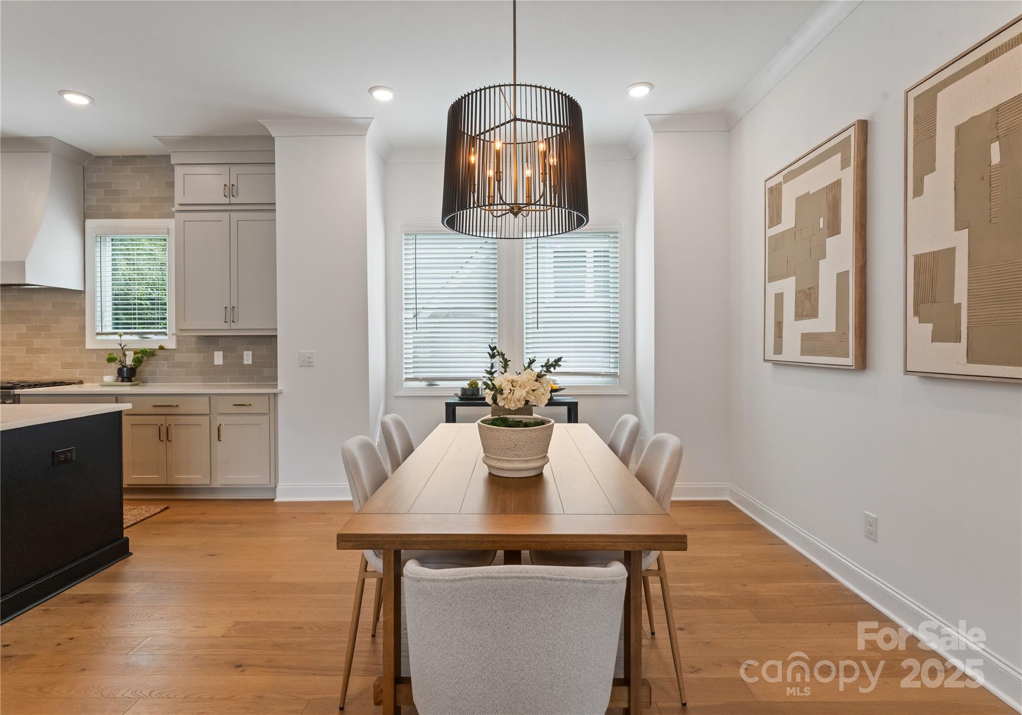 4215 Walker Road Charlotte, NC 28211 - Photo 7 of 43 a view of a kitchen area with furniture and wooden floor