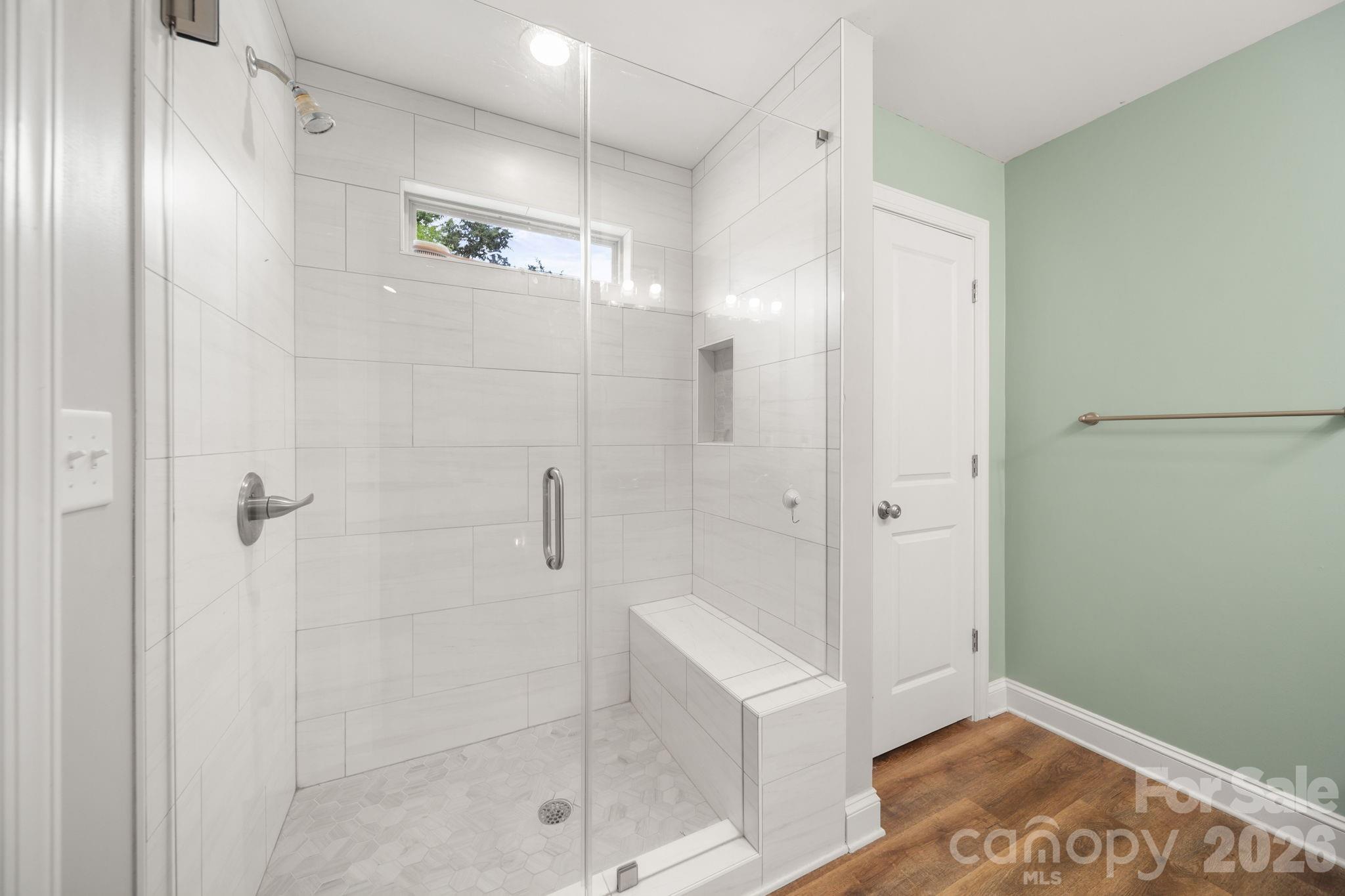 5311 Flint Ridge Marshville, NC 28103 - Photo 16 of 38 a bathroom with a shower and a sink