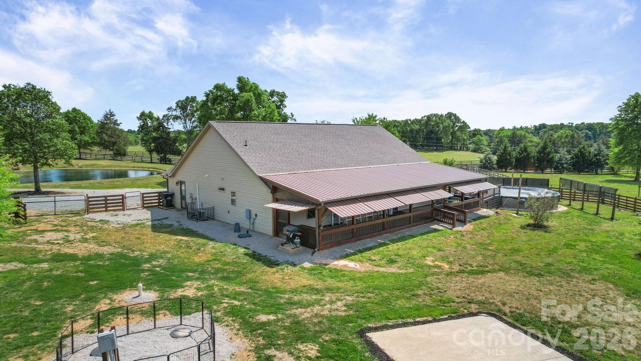 5311 Flint Ridge Marshville, NC 28103 - Photo 24 of 38 a aerial view of a house with swimming pool garden and patio