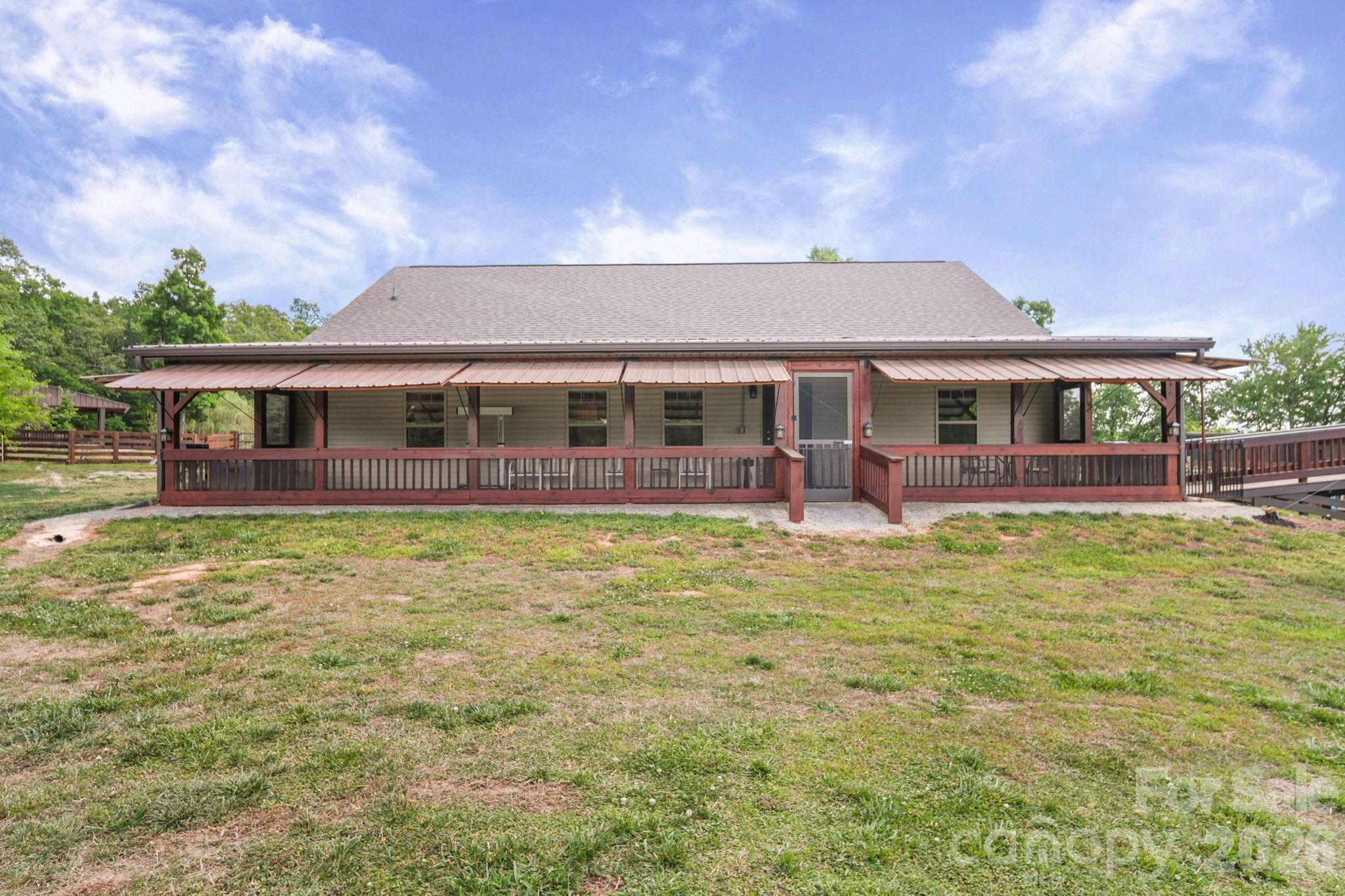 5311 Flint Ridge Marshville, NC 28103 - Photo 25 of 38 a view of a house with a swimming pool