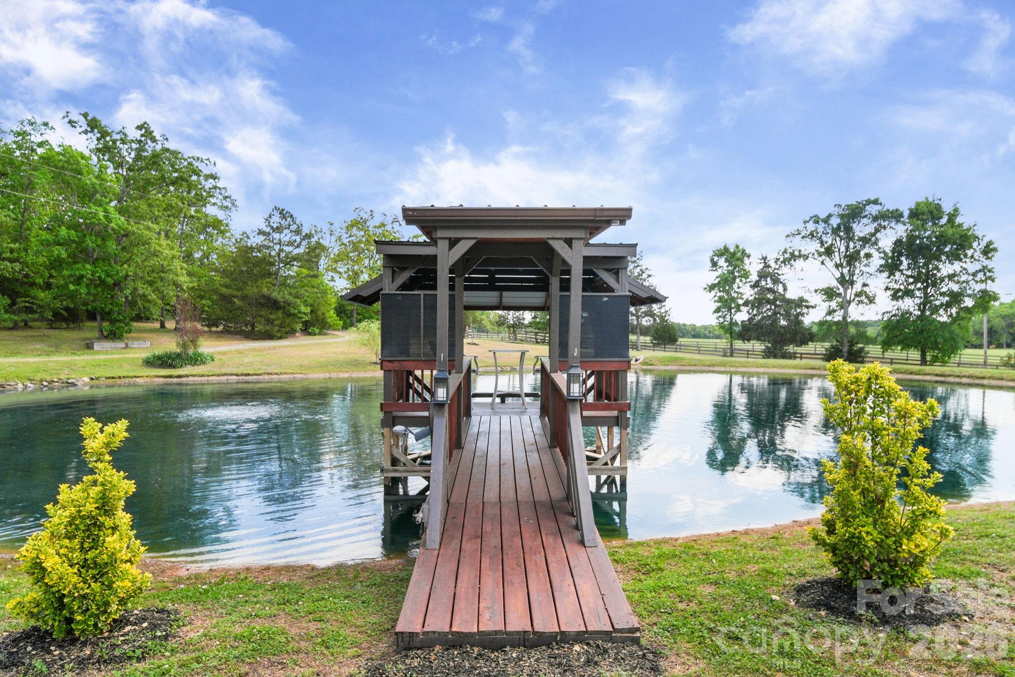 5311 Flint Ridge Marshville, NC 28103 - Photo 27 of 38 a front view of a house with a yard