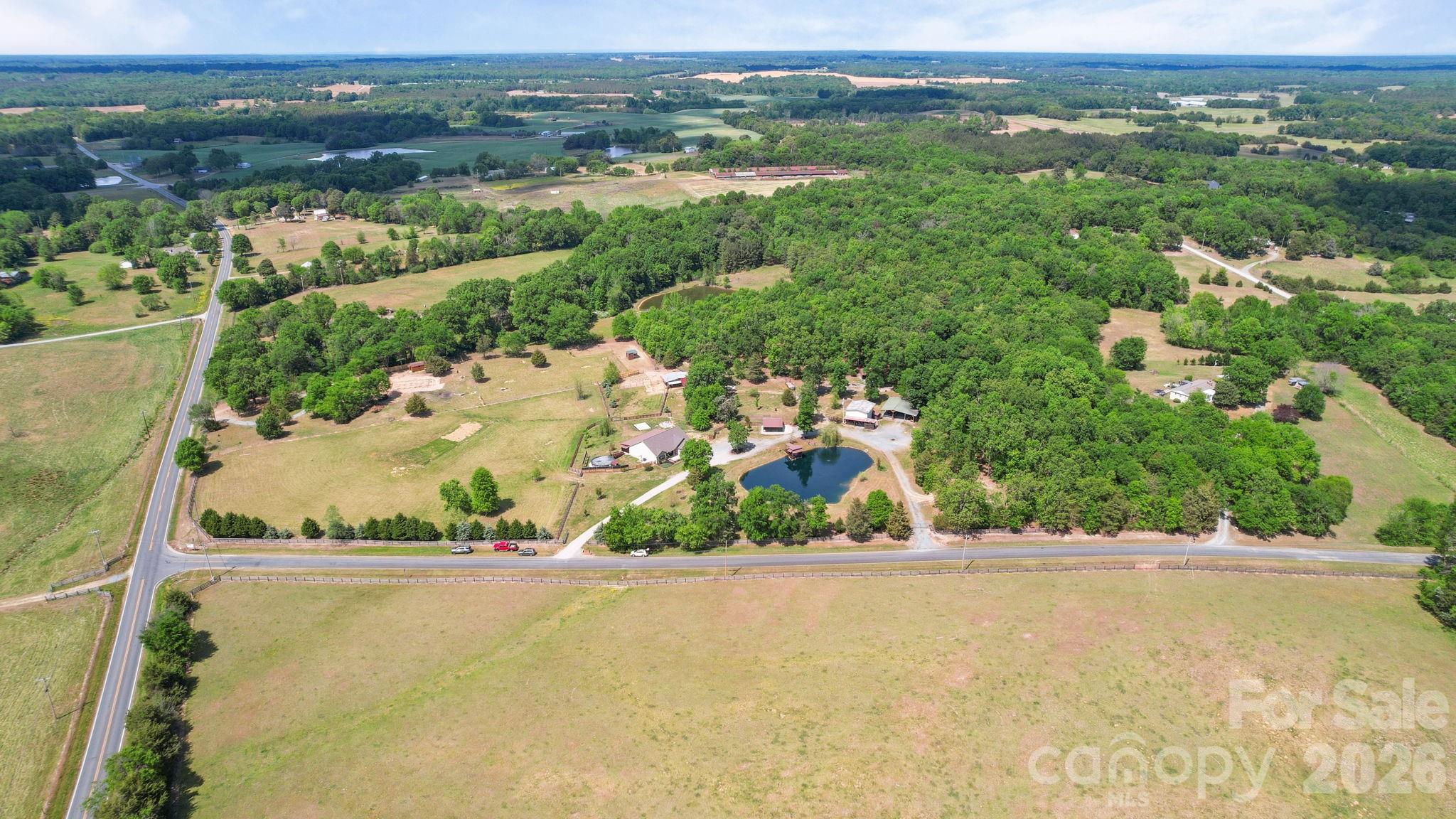5311 Flint Ridge Marshville, NC 28103 - Photo 37 of 38 an aerial view of lake and residential houses with outdoor space