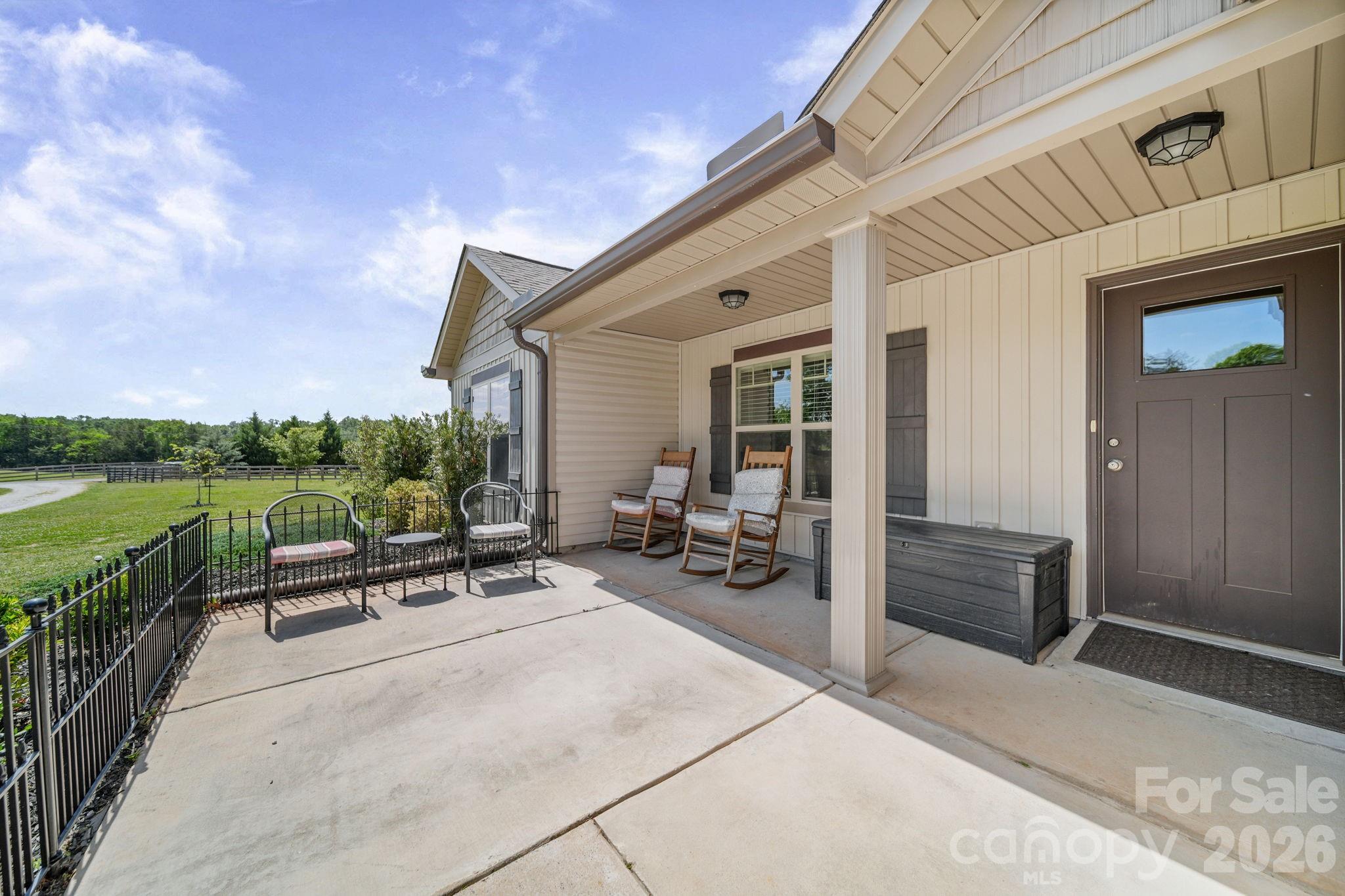 5311 Flint Ridge Marshville, NC 28103 - Photo 4 of 38 a view of a patio with chair and table in the patio