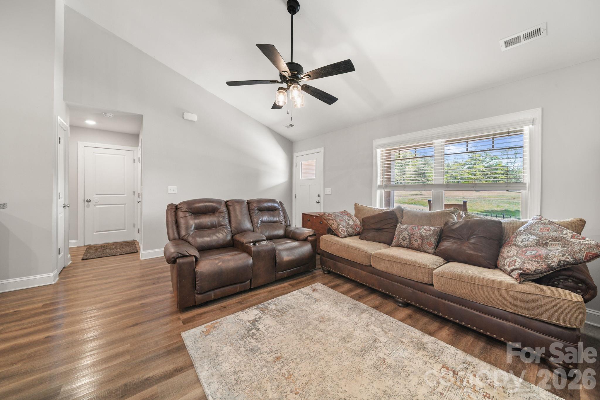 5311 Flint Ridge Marshville, NC 28103 - Photo 6 of 38 a living room with furniture and a large window