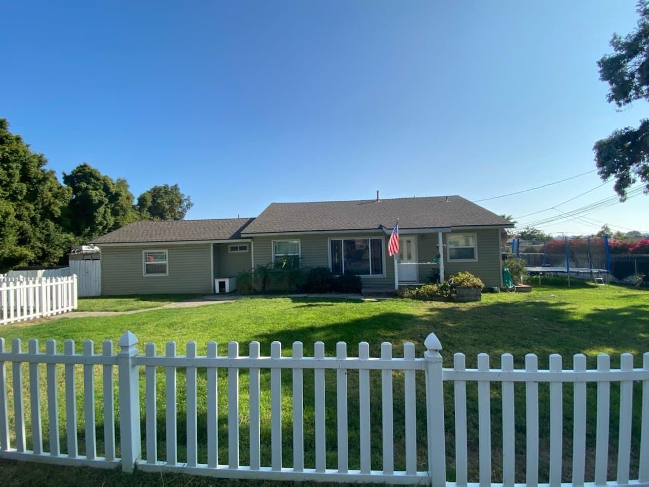 9035 Rosedale Drive Spring Valley, CA 91977 - Photo 2 of 14 a front view of house with yard and green space