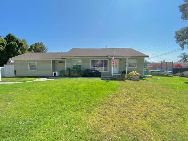 9035 Rosedale Drive Spring Valley, CA 91977 - Photo 3 of 14 a front view of a house with garden