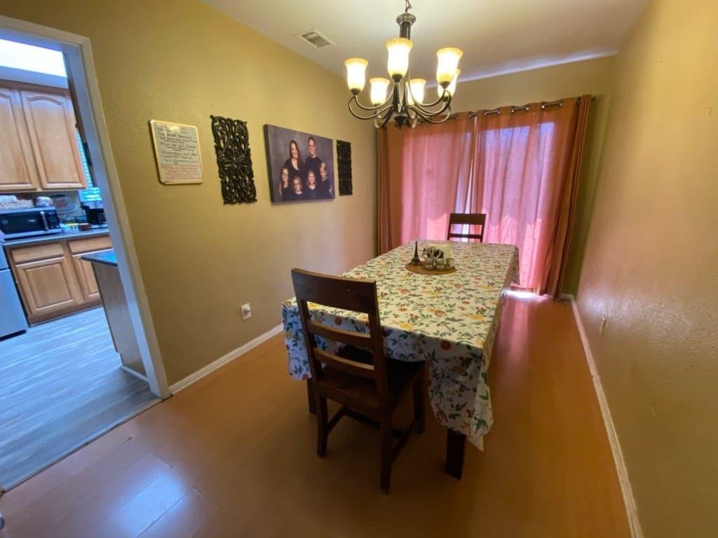 9035 Rosedale Drive Spring Valley, CA 91977 - Photo 10 of 14 a view of a dining room with furniture and wooden floor