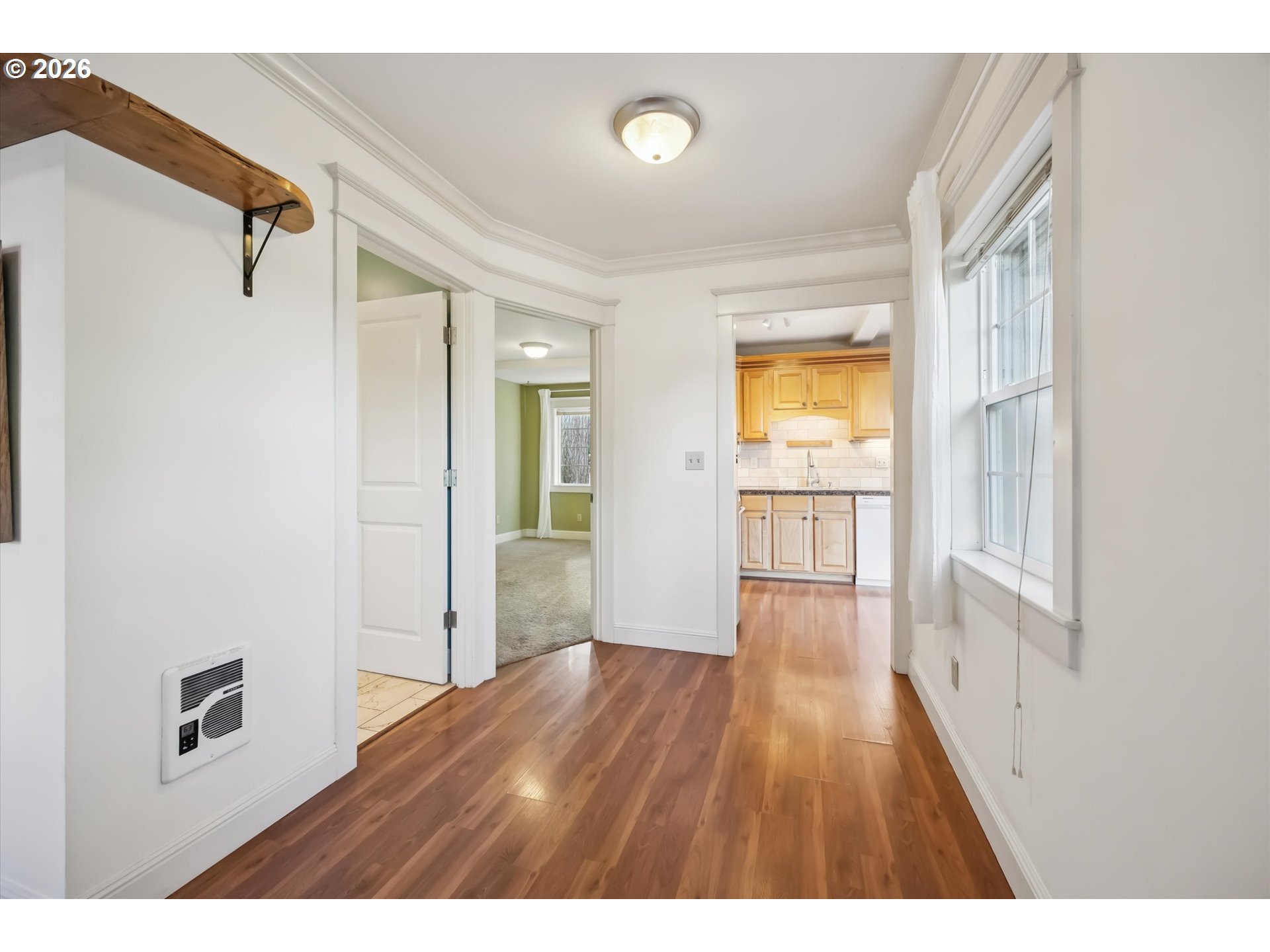 6118 Northeast Alton Street Portland, OR 97213 - Photo 13 of 46 a view of empty room with wooden floor and fan