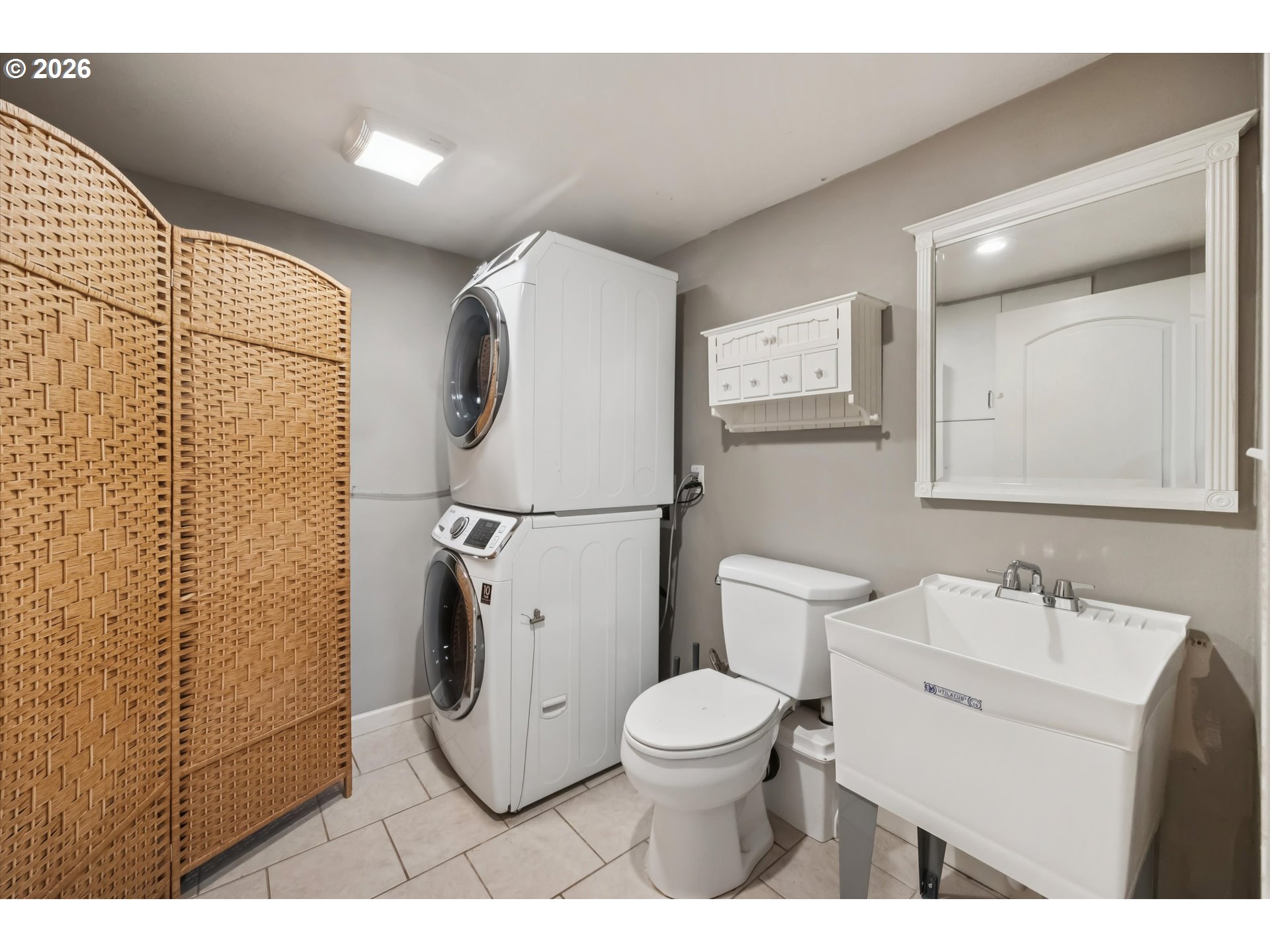 6118 Northeast Alton Street Portland, OR 97213 - Photo 39 of 46 a bathroom with a toilet sink and shower