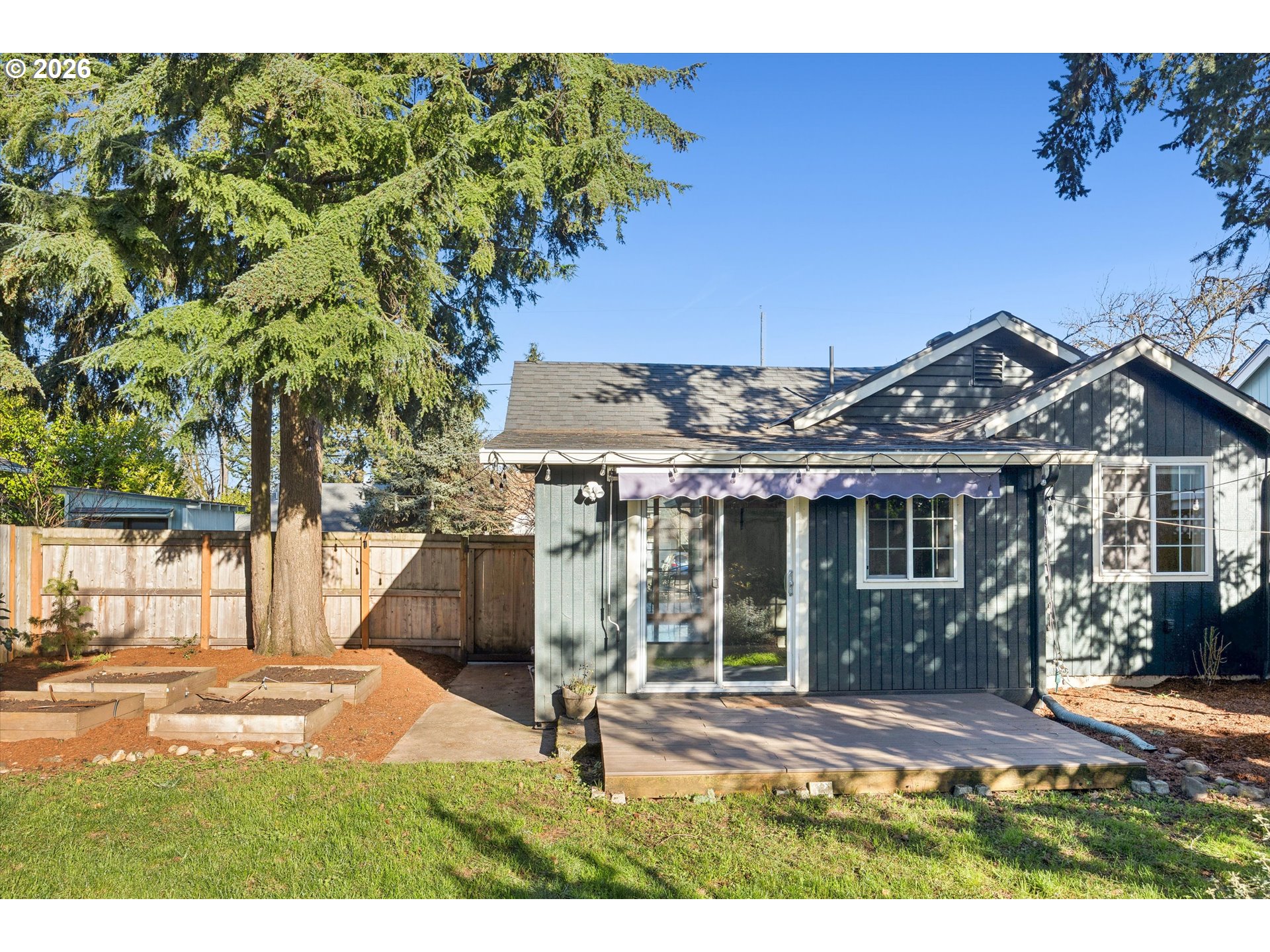 6118 Northeast Alton Street Portland, OR 97213 - Photo 41 of 46 a view of a house with a yard