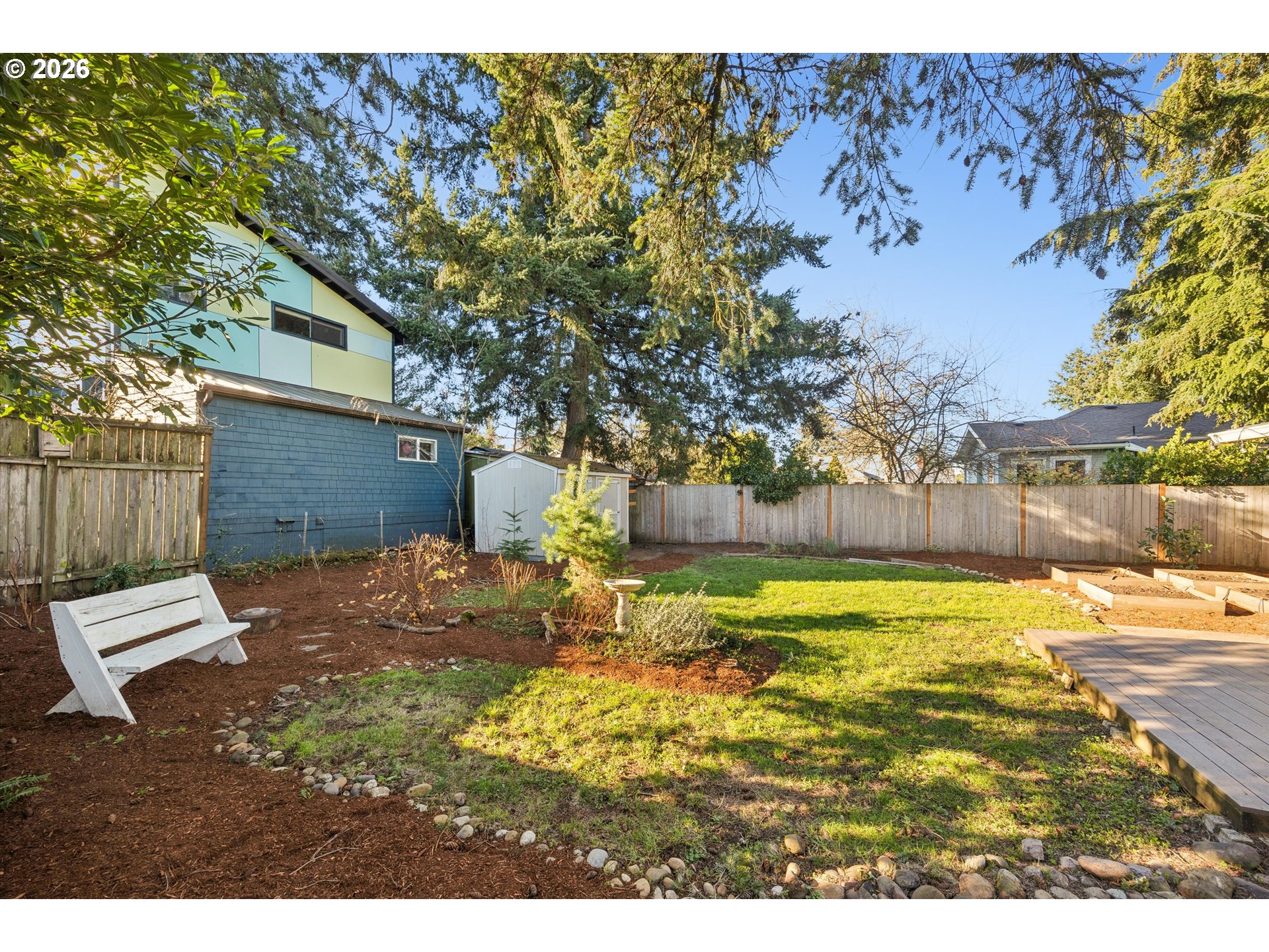 6118 Northeast Alton Street Portland, OR 97213 - Photo 42 of 46 a view of a yard with a house