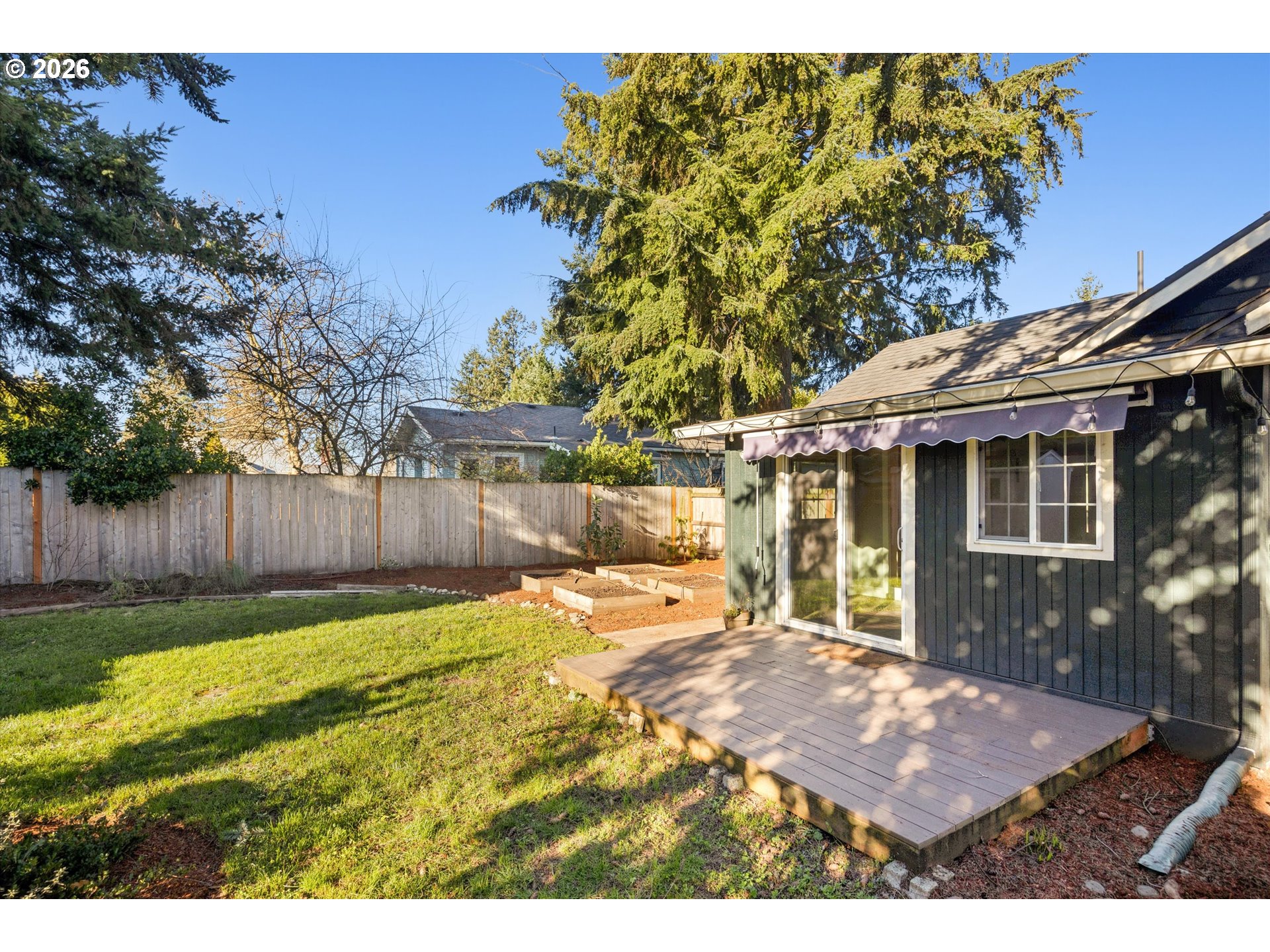 6118 Northeast Alton Street Portland, OR 97213 - Photo 43 of 46 a view of a backyard with a small cabin