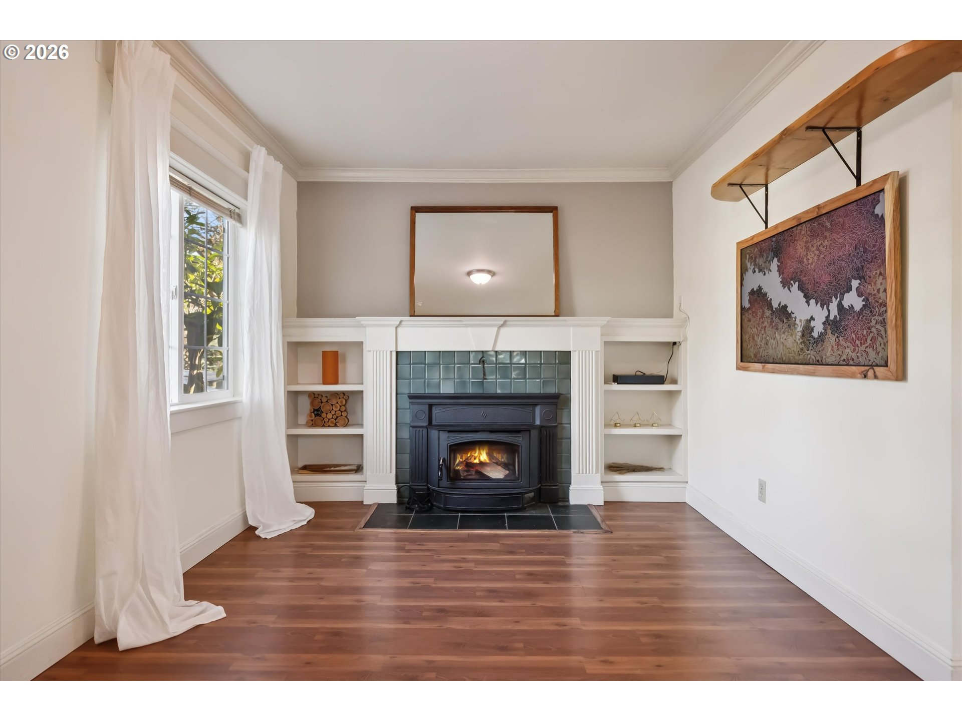 6118 Northeast Alton Street Portland, OR 97213 - Photo 9 of 46 a living room with furniture and a fireplace