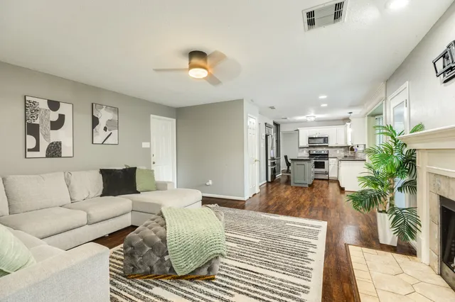 a living room with furniture and a couch