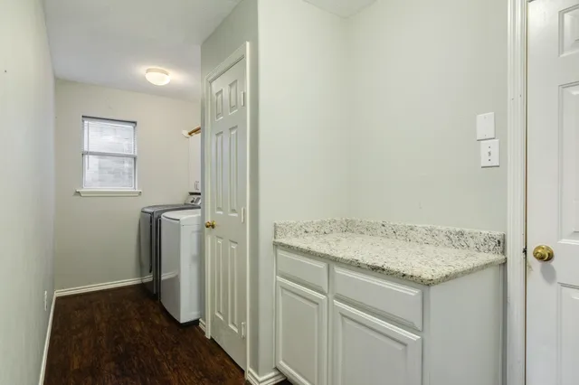 a view of a storage & utility room with a sink