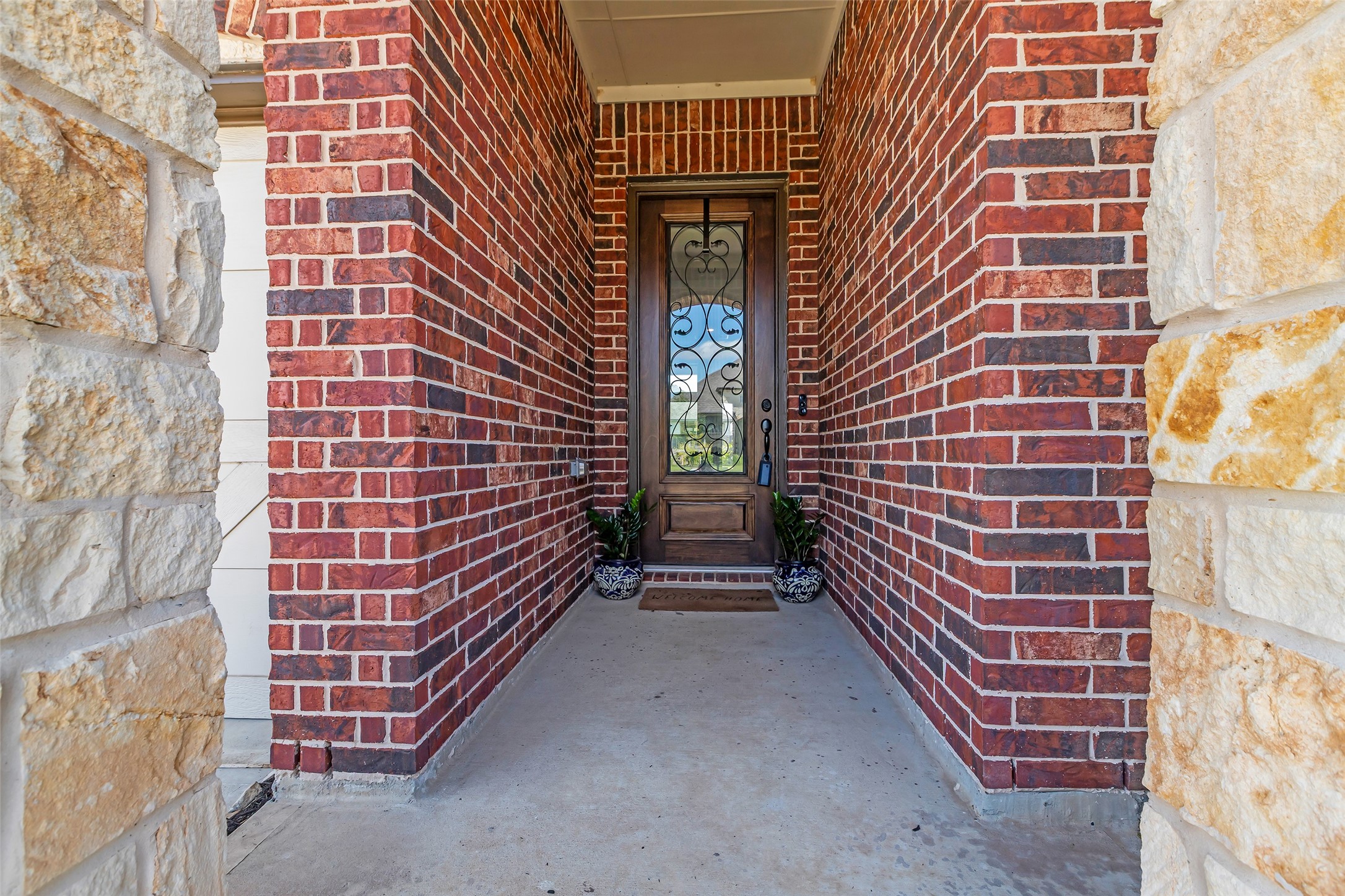 423 Round Top Street Webster, TX 77598 - Photo 4 of 49 Great glass leaded door welcomes you and your guests as well as extra light.