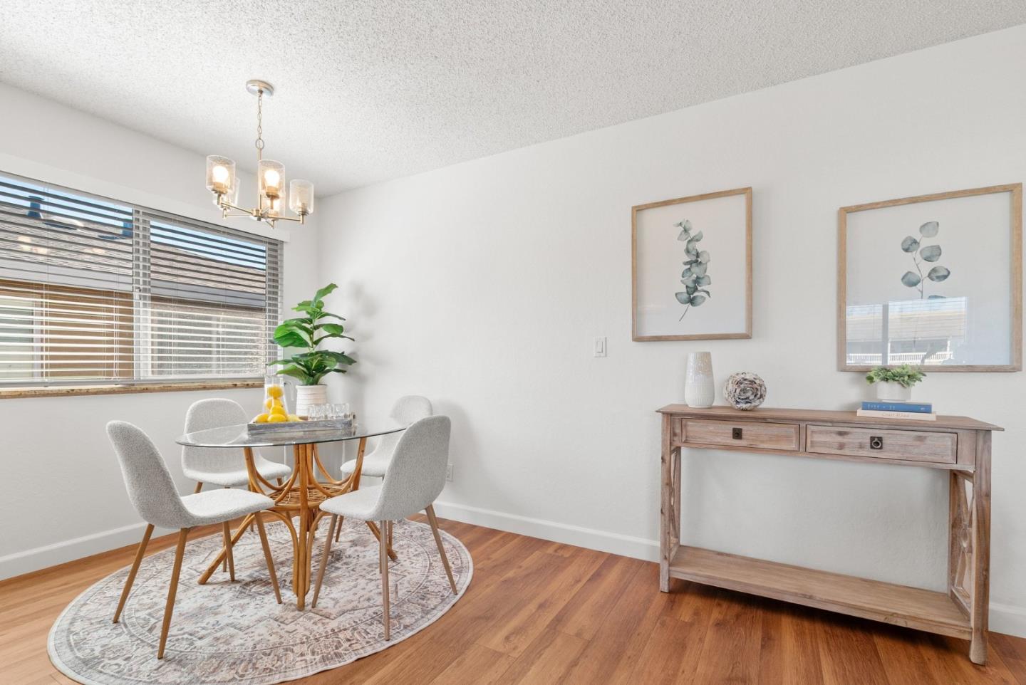 4465 Diamond Street, Unit 4 Capitola, CA 95010 - Photo 11 of 41 a dining room with furniture and window