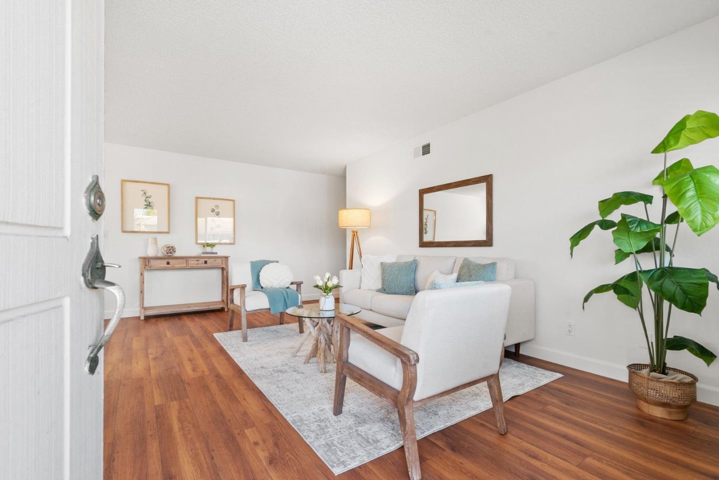 4465 Diamond Street, Unit 4 Capitola, CA 95010 - Photo 2 of 41 a living room with furniture and a potted plant