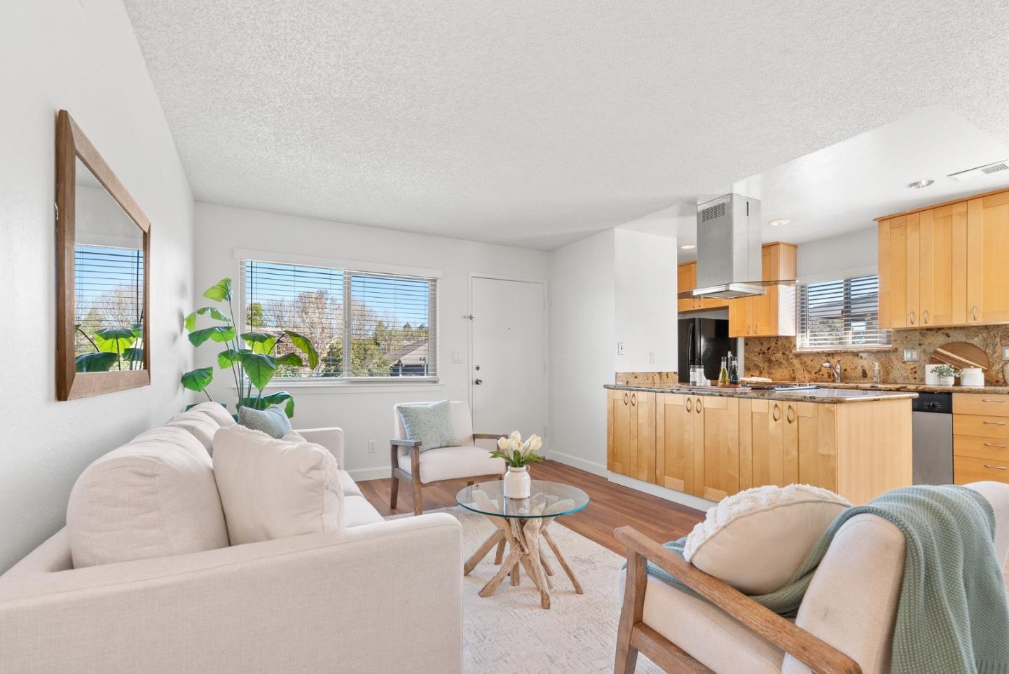 4465 Diamond Street, Unit 4 Capitola, CA 95010 - Photo 9 of 41 a living room with furniture and a large window