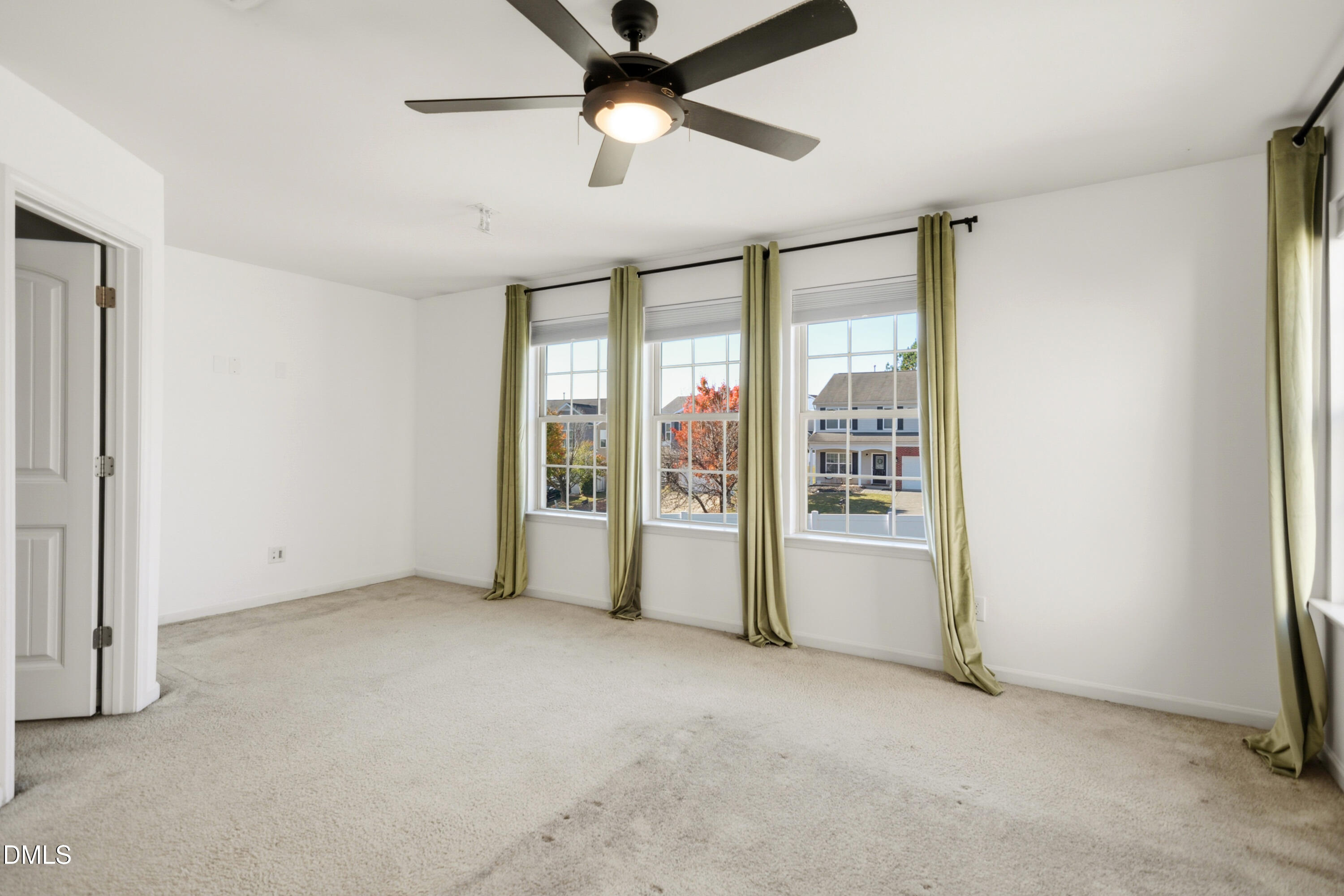 2700 Benevolence Drive Raleigh, NC 27610 - Photo 9 of 18 a view of an empty room with a window