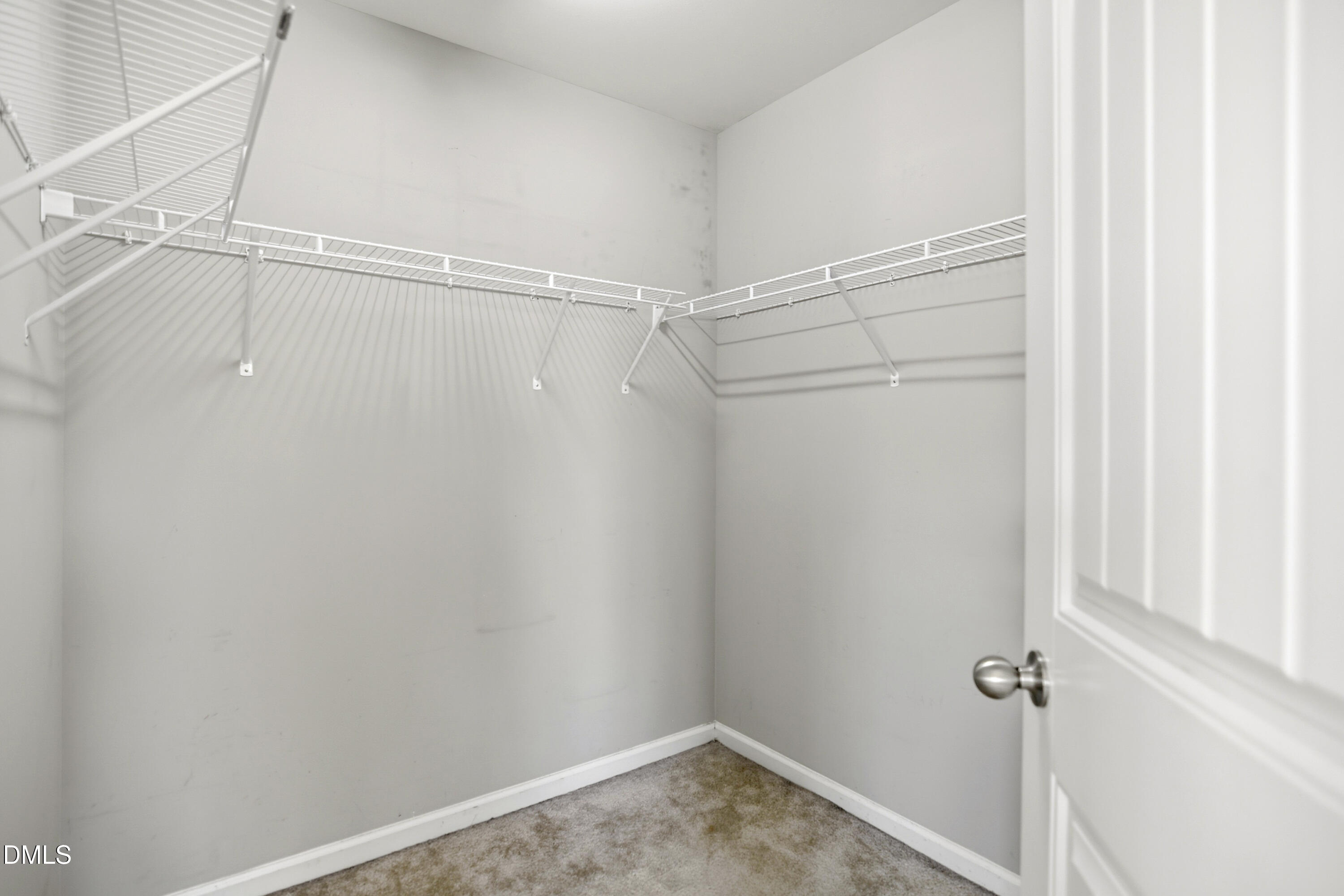 2700 Benevolence Drive Raleigh, NC 27610 - Photo 10 of 18 a view of a room with racks on the wall