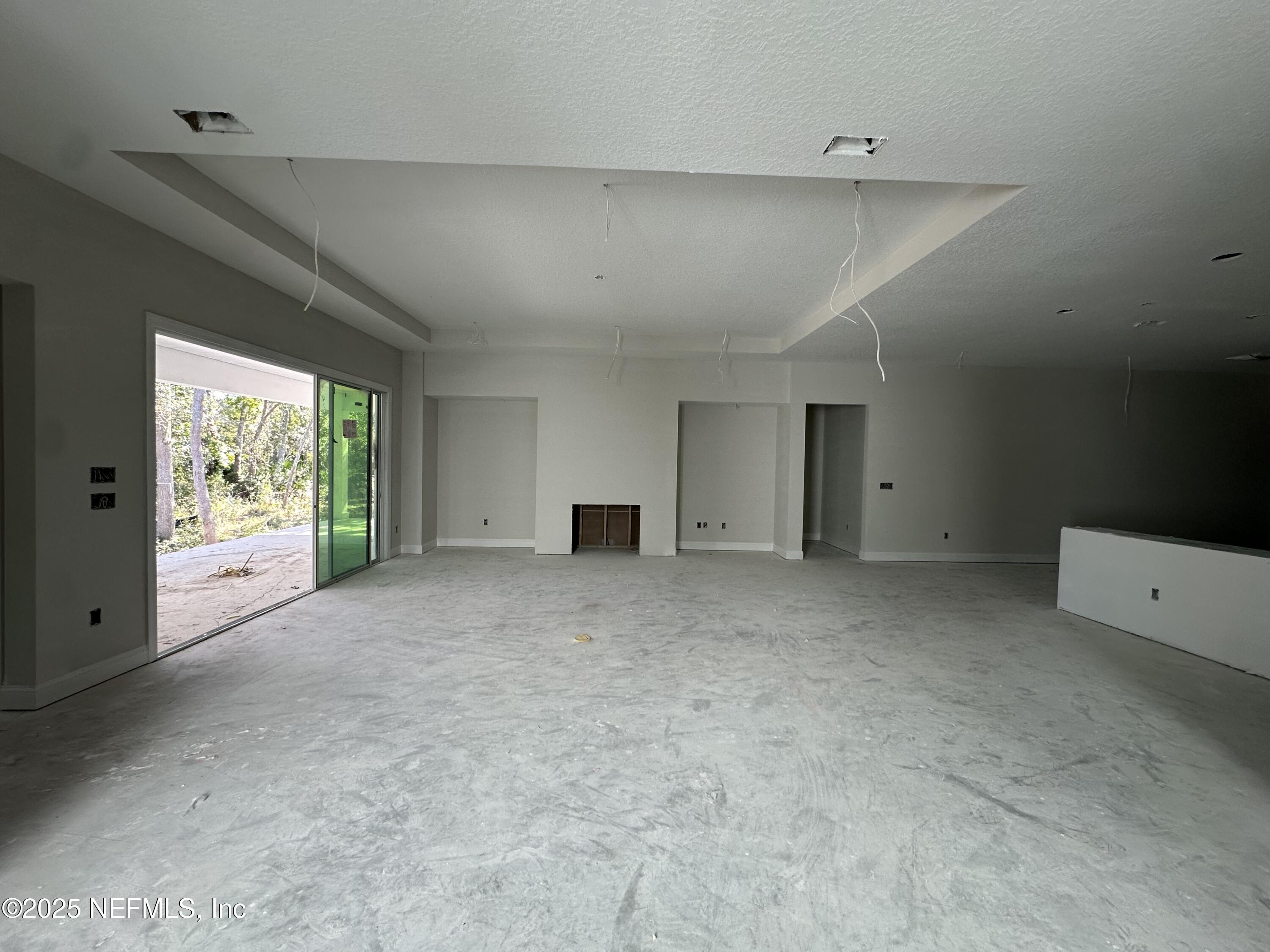 118 Historic Brick Lane St. Augustine, FL 32095 - Photo 12 of 36 a view of an empty room with a window