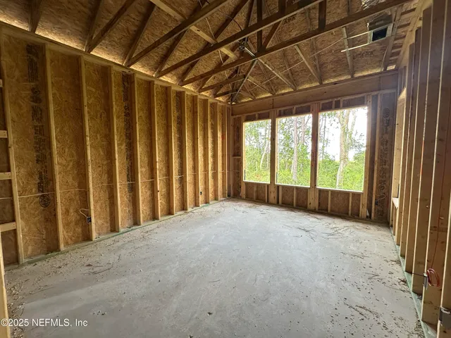 a close view of a utility room with dryer and washer