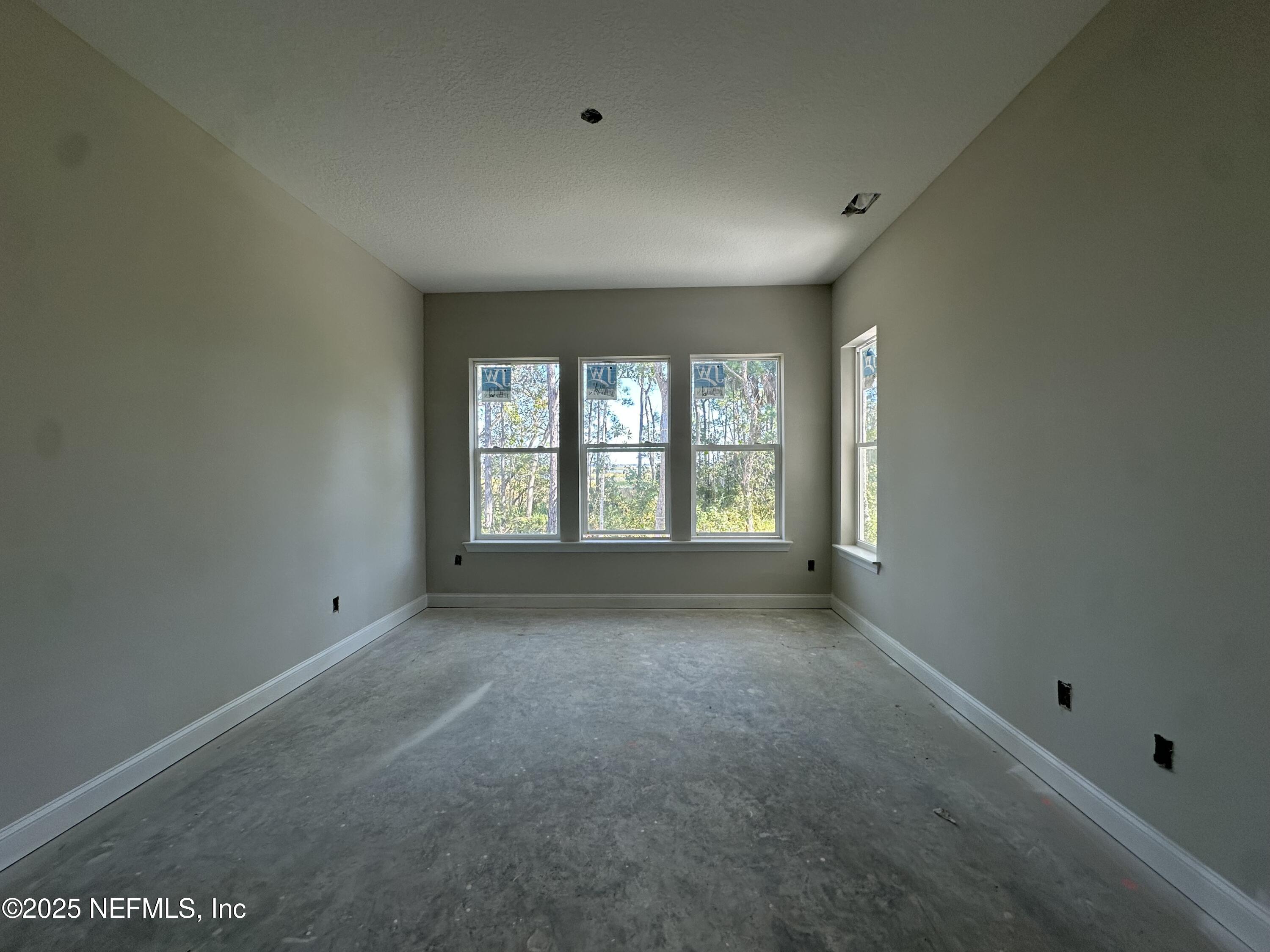 118 Historic Brick Lane St. Augustine, FL 32095 - Photo 16 of 36 an empty room with a window