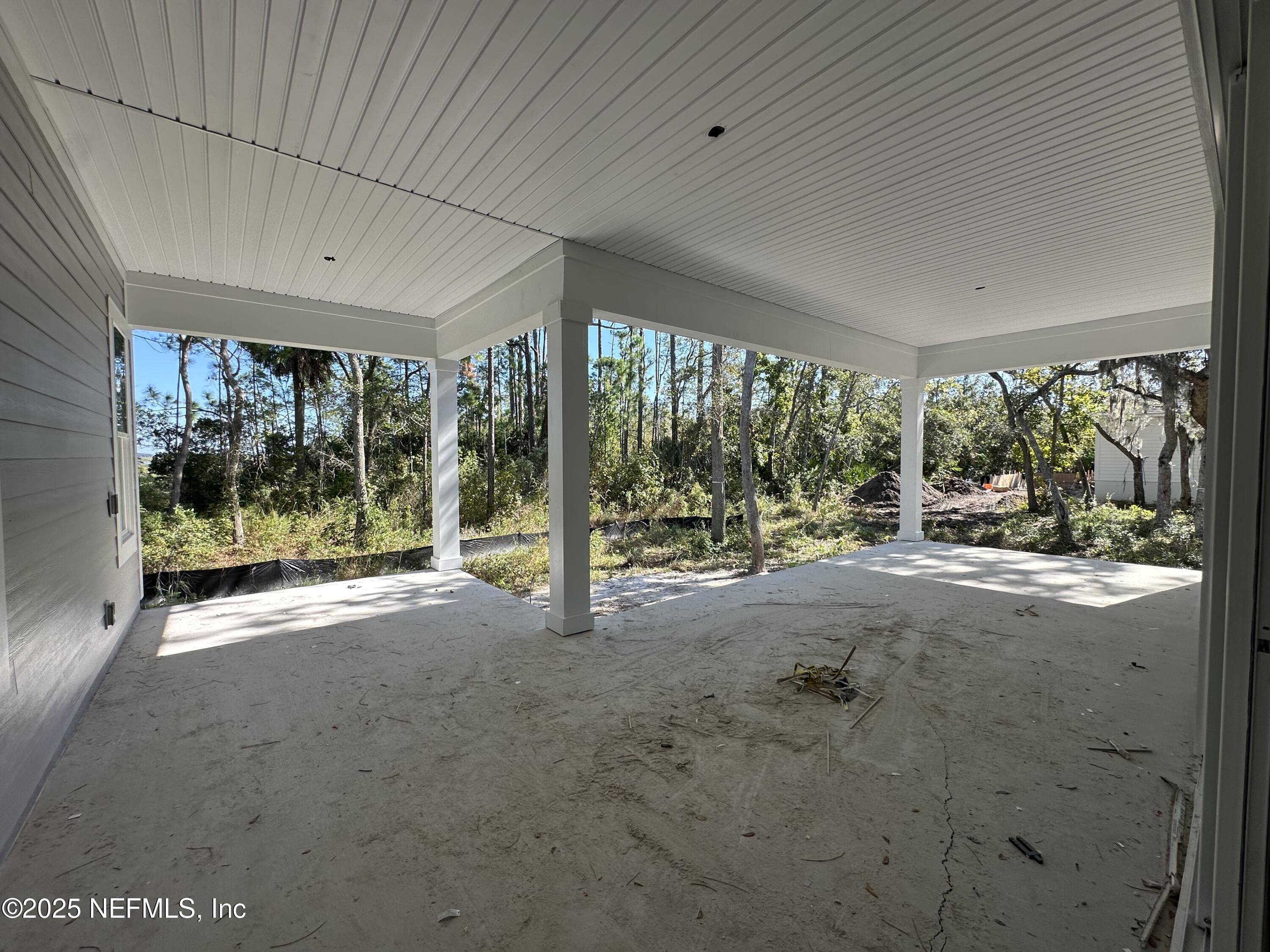 118 Historic Brick Lane St. Augustine, FL 32095 - Photo 6 of 36 a view of a room with a large window