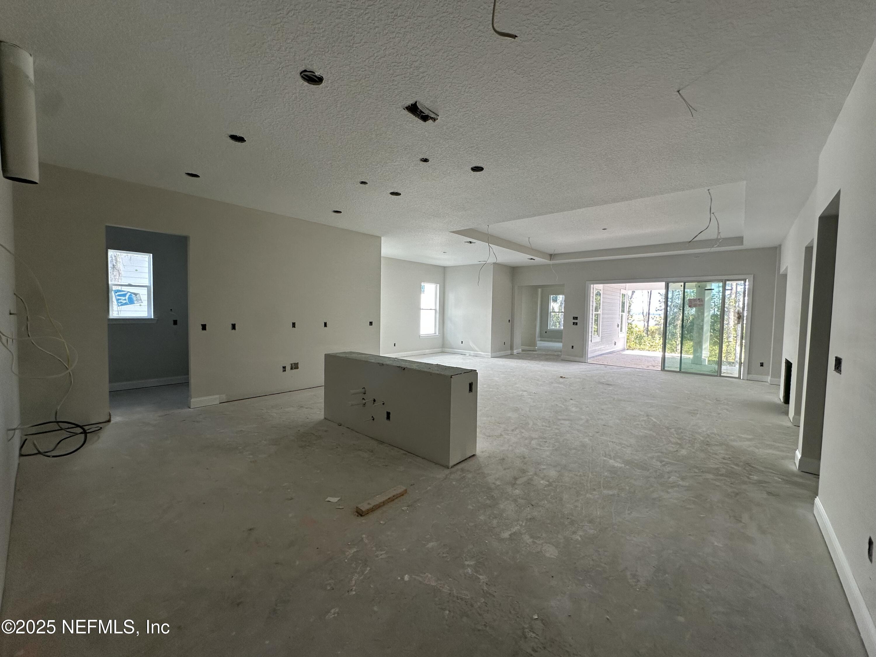 118 Historic Brick Lane St. Augustine, FL 32095 - Photo 10 of 36 a view of an empty room with a window