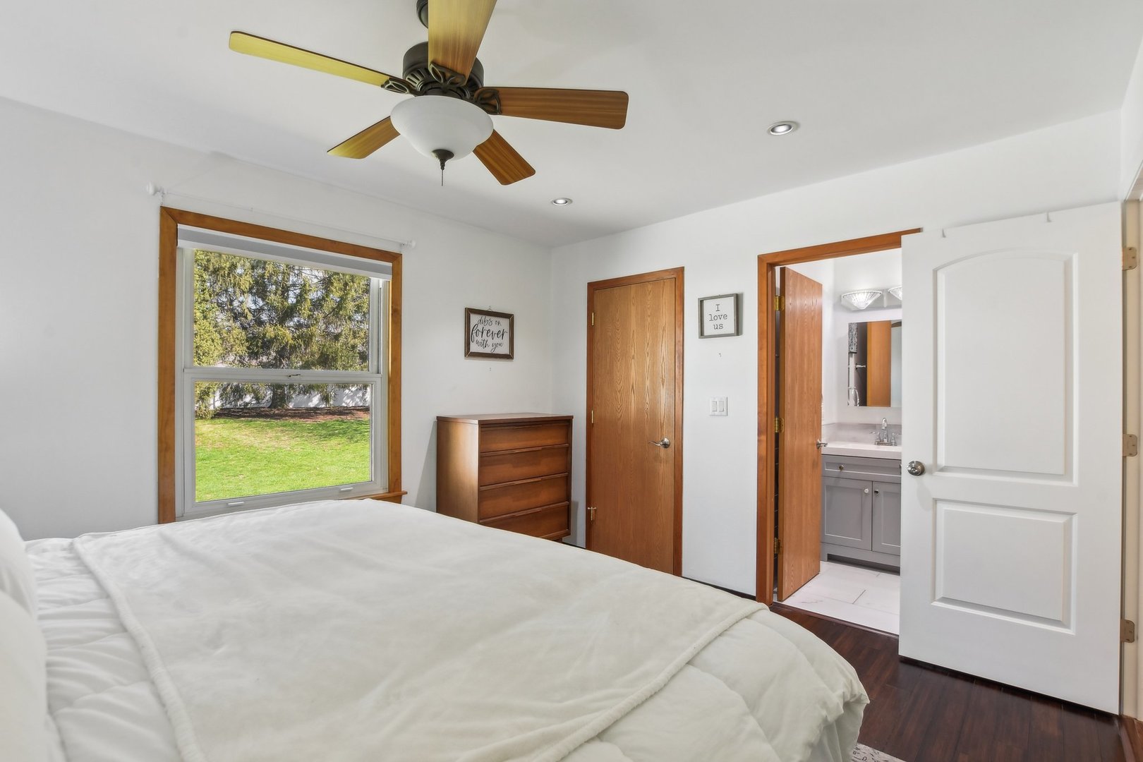 810 Case Drive Roselle, IL 60172 - Photo 16 of 34 a bedroom with a bed and a painting on the wall