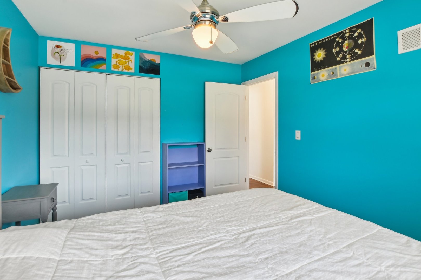 810 Case Drive Roselle, IL 60172 - Photo 19 of 34 a bedroom with a bed and a chandelier