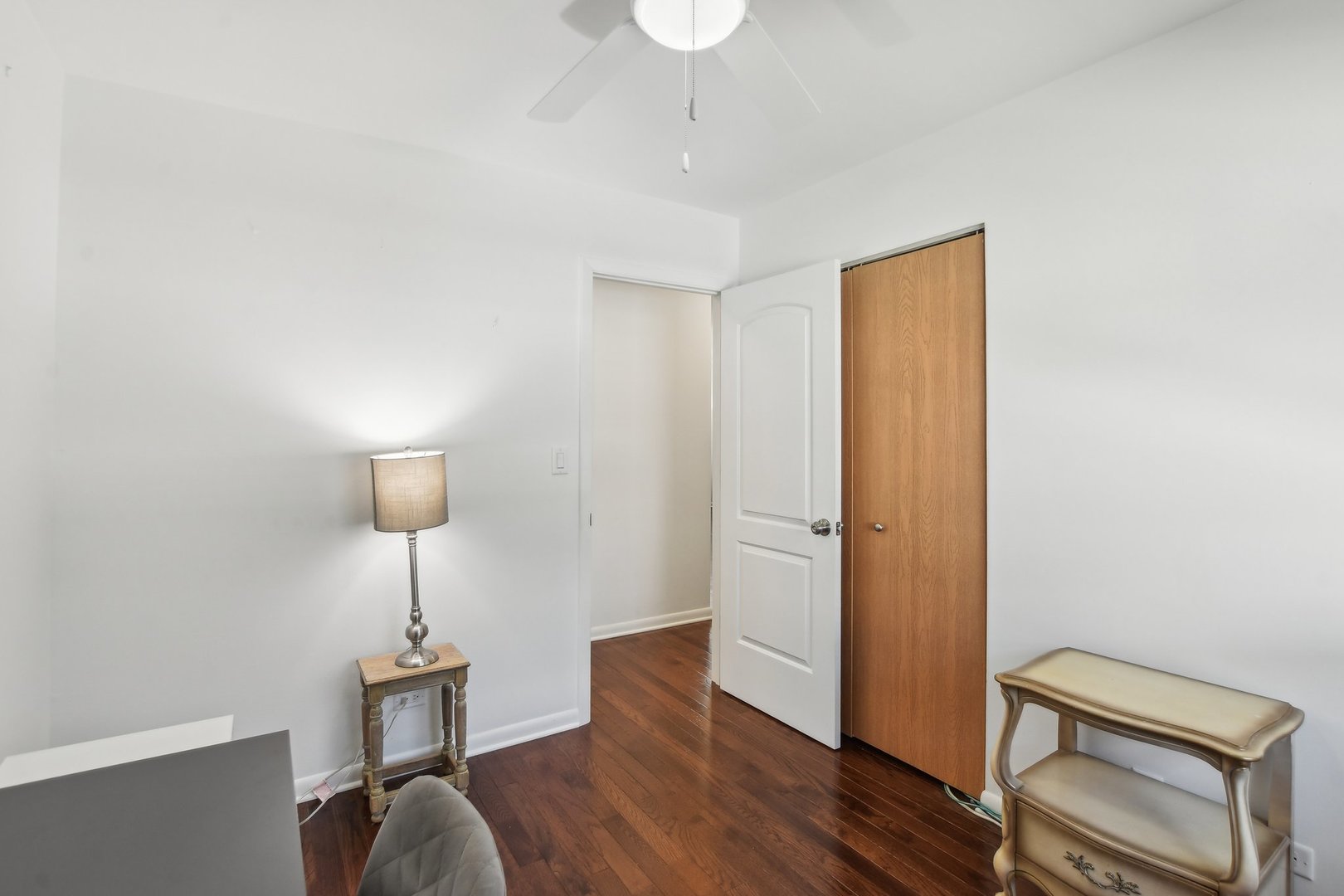 810 Case Drive Roselle, IL 60172 - Photo 20 of 34 a view of empty room with wooden floor
