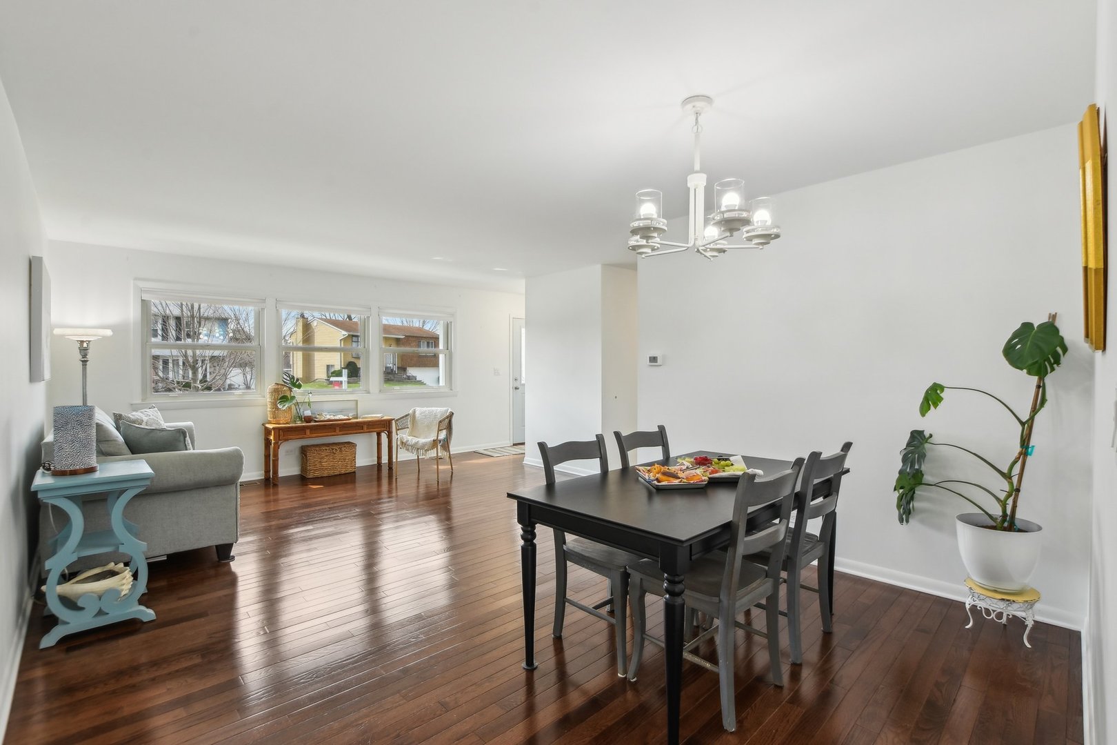 810 Case Drive Roselle, IL 60172 - Photo 6 of 34 a view of a dining room with furniture and wooden floor