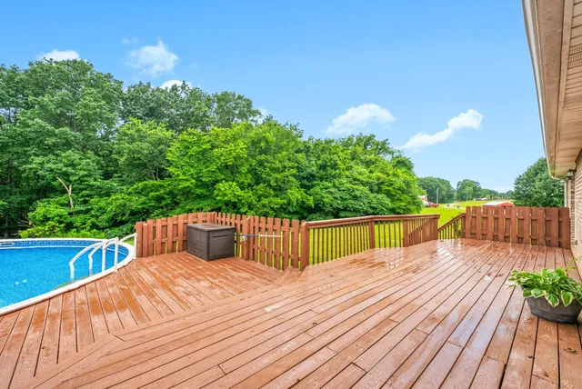 a balcony with wooden floor