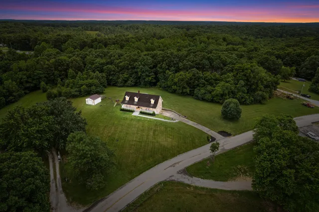 a view of a water with a yard