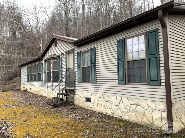 a room with furniture and gym equipment