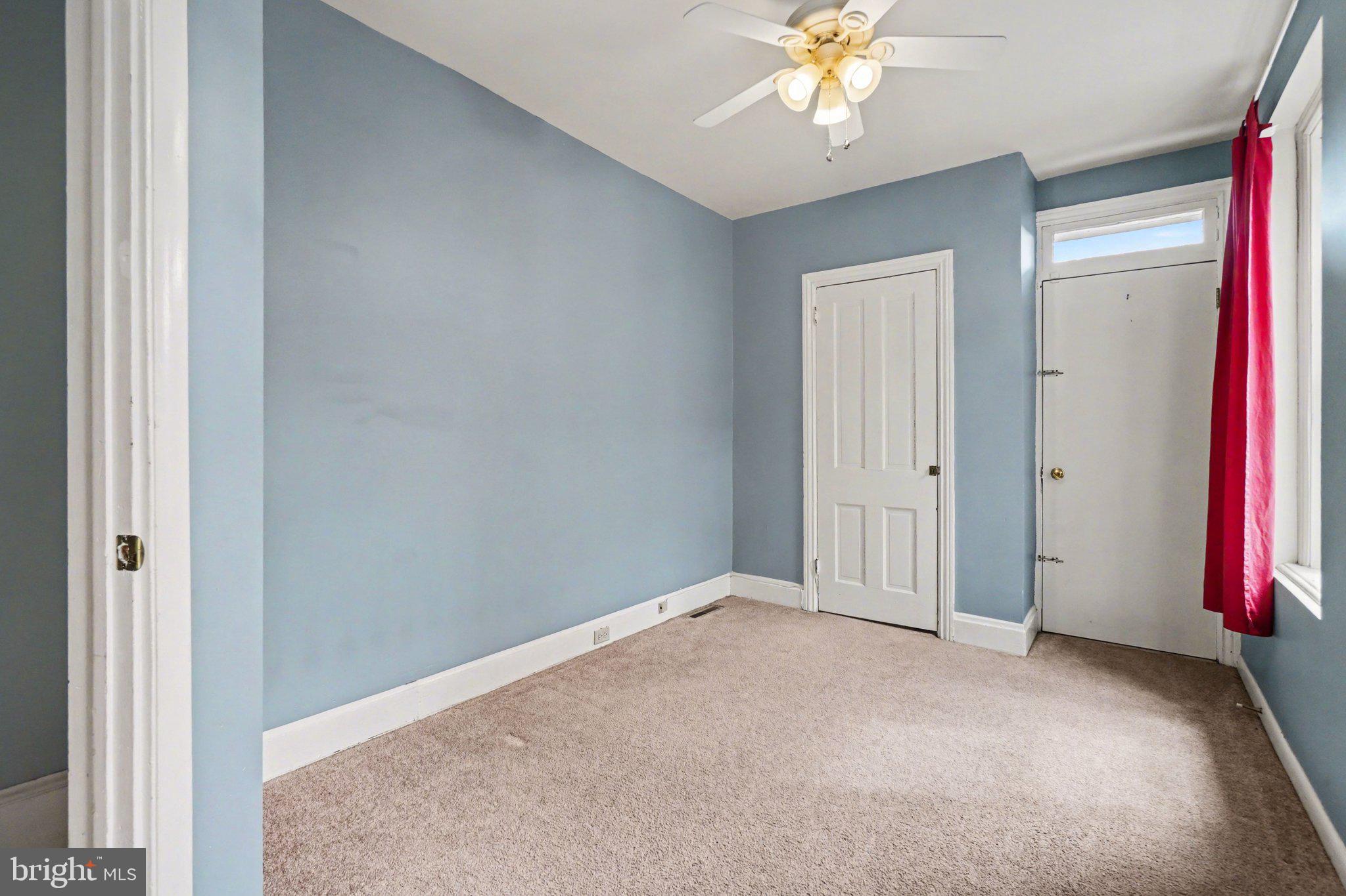 261 Delaware Street Harrisburg, PA 17102 - Photo 13 of 40 wooden floor and window in an empty room