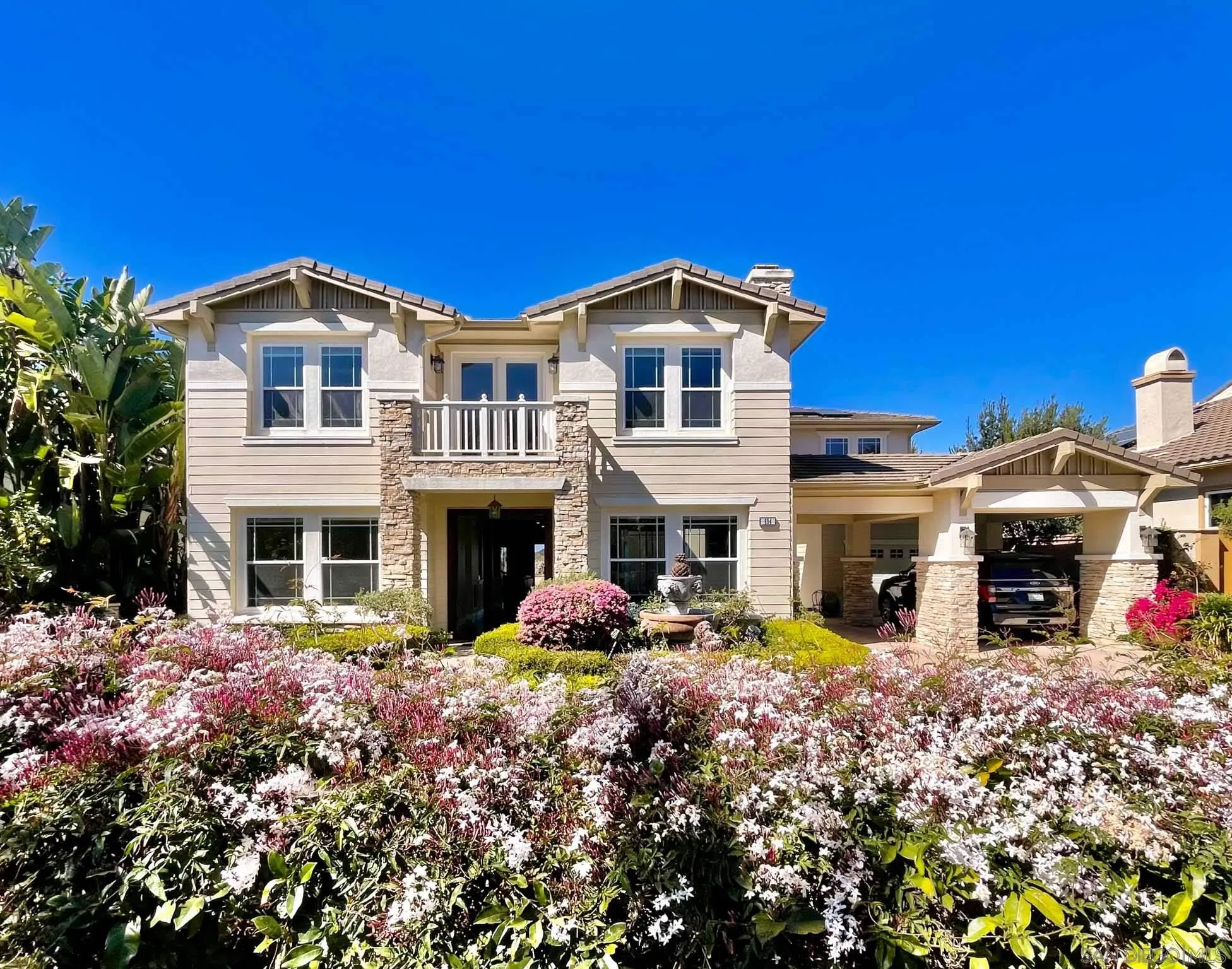 694 Cypress Hills Drive Encinitas, CA 92024 - Photo 1 of 49 a front view of a house with yard and seating area