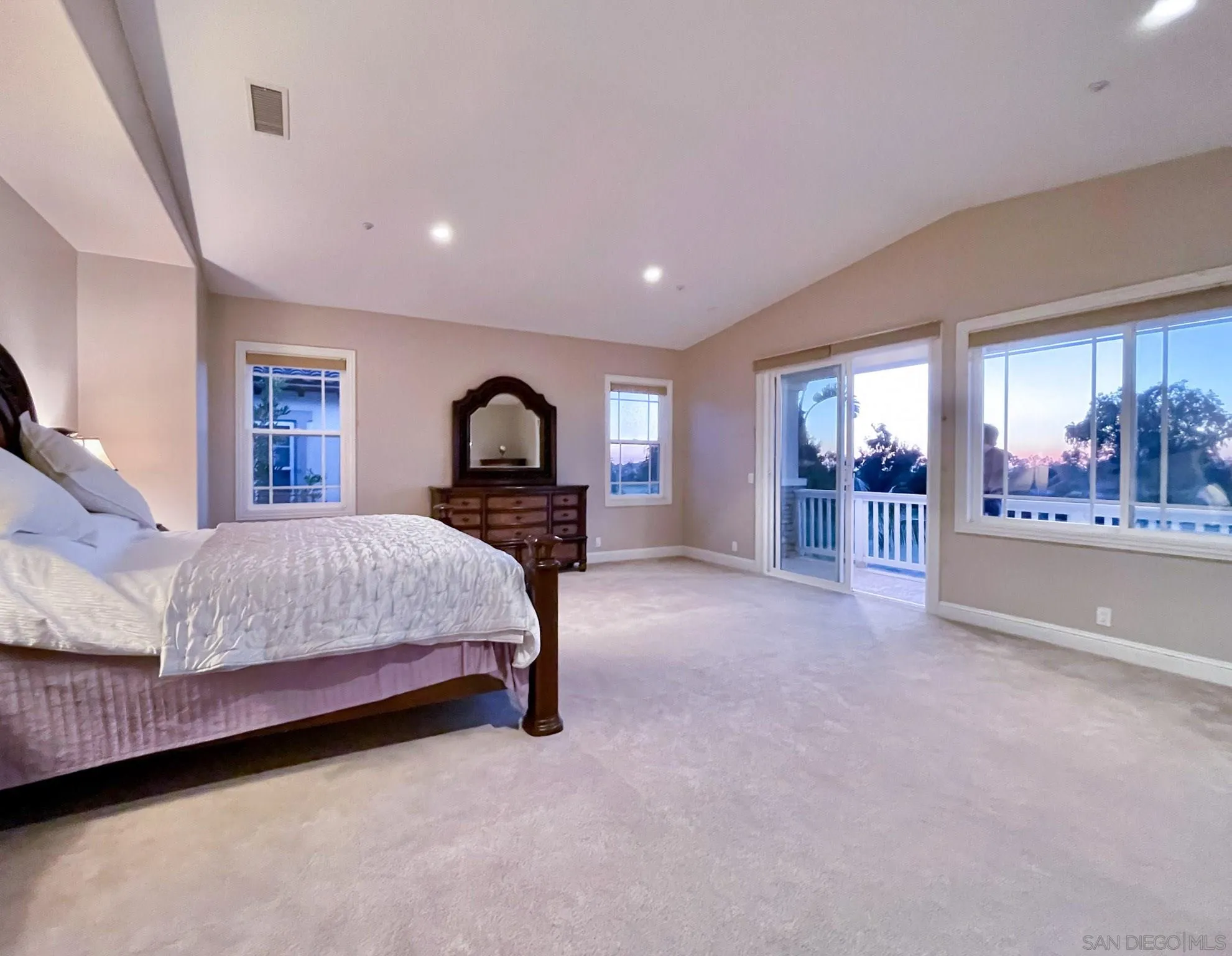 694 Cypress Hills Drive Encinitas, CA 92024 - Photo 28 of 49 a bed room with a bed and a large window