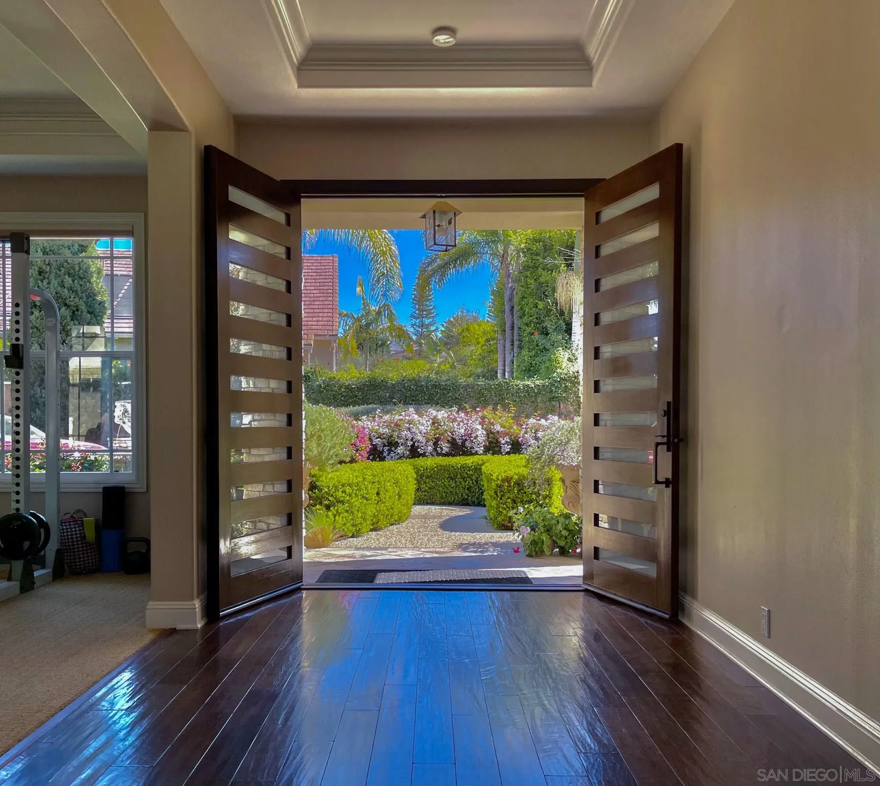 694 Cypress Hills Drive Encinitas, CA 92024 - Photo 9 of 49 a view of room with window and wooden floor