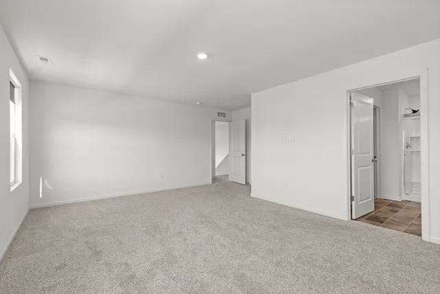 an empty room with a natural light