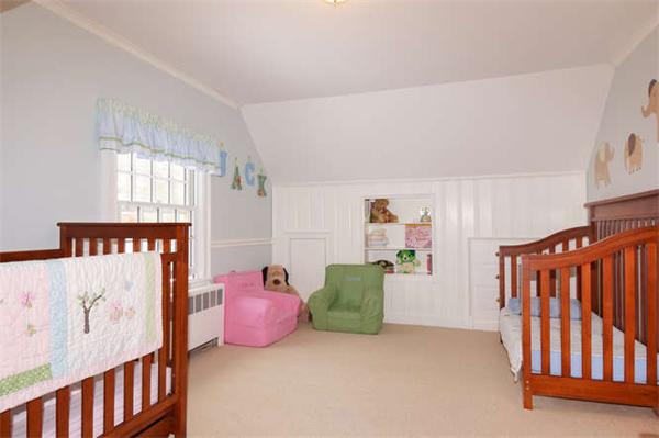 24 Colby Road Wellesley, MA 02482 - Photo 11 of 16 a bedroom with furniture and a large window