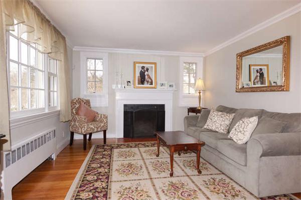 24 Colby Road Wellesley, MA 02482 - Photo 3 of 16 a living room with furniture and a fireplace