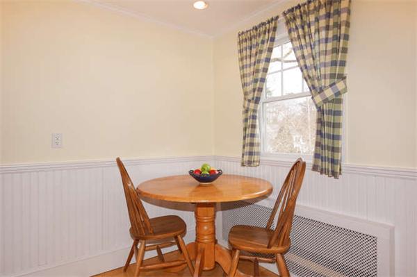 24 Colby Road Wellesley, MA 02482 - Photo 8 of 16 a view of a dining room with furniture and wooden floor