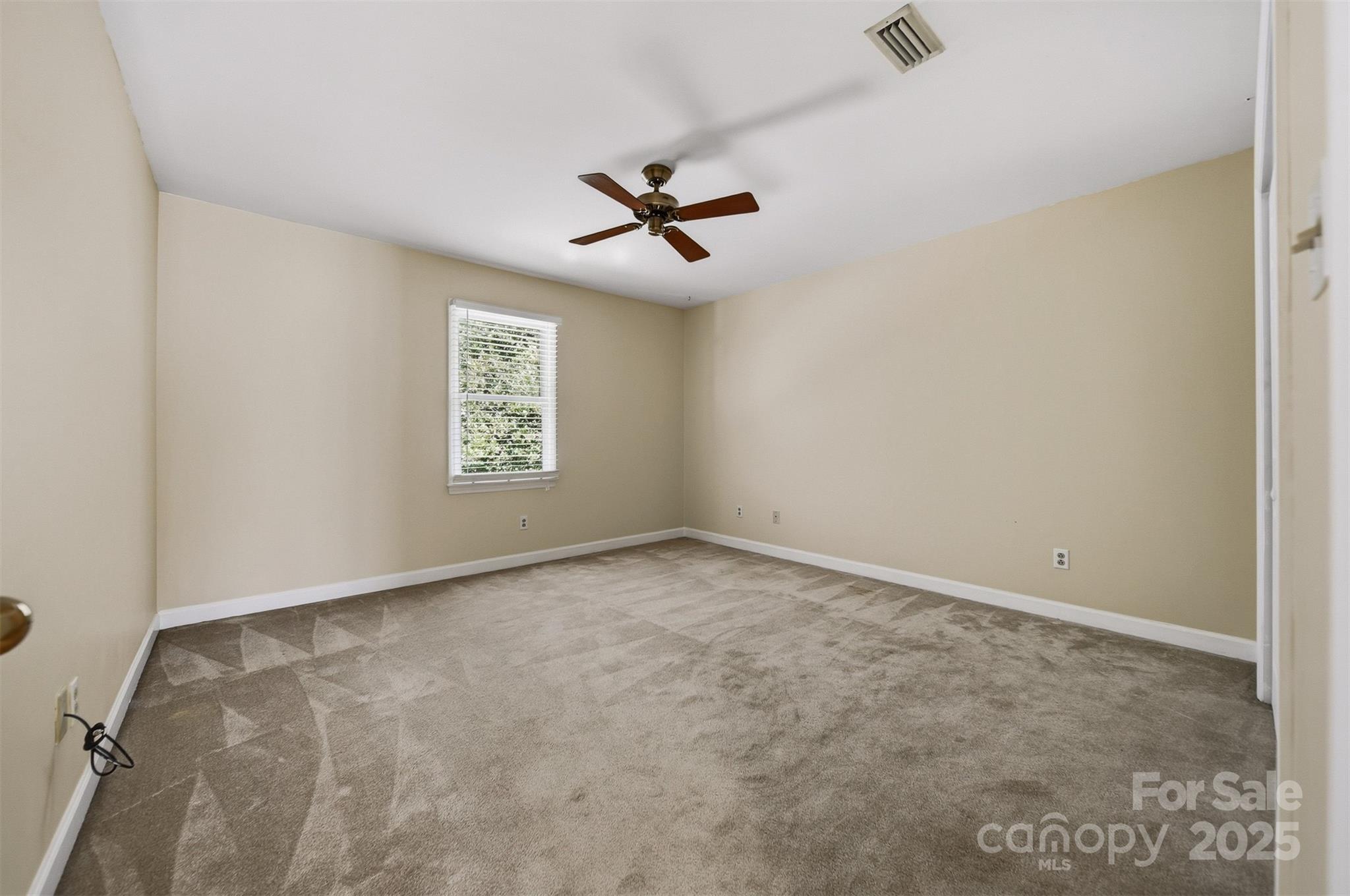 147 35th Avenue Northeast Hickory, NC 28601 - Photo 27 of 43 an empty room with windows and fan