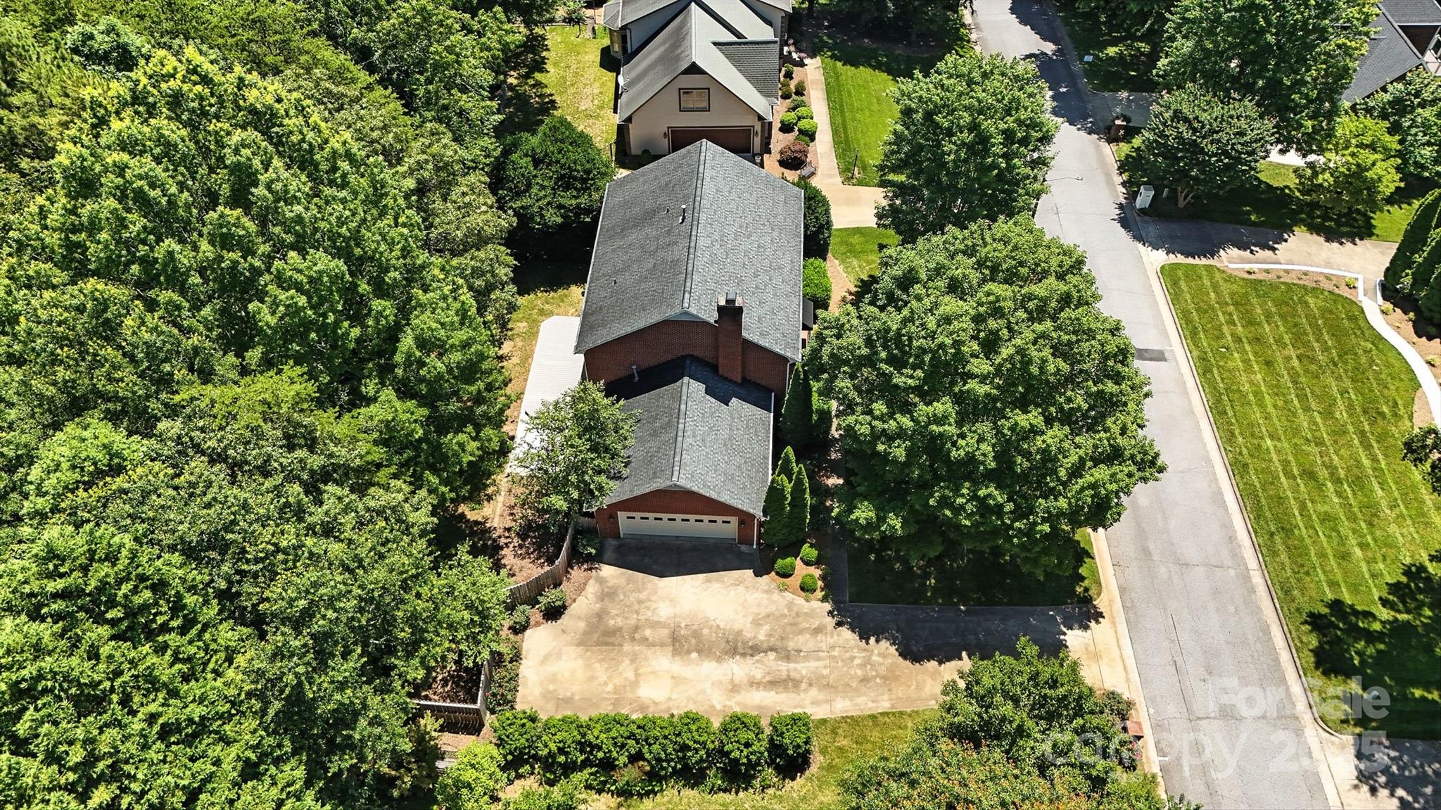 147 35th Avenue Northeast Hickory, NC 28601 - Photo 41 of 43 an aerial view of a house with a yard and garden
