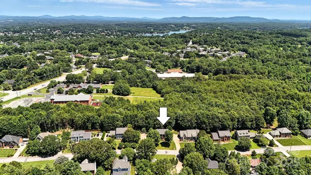 an aerial view of residential house with outdoor space